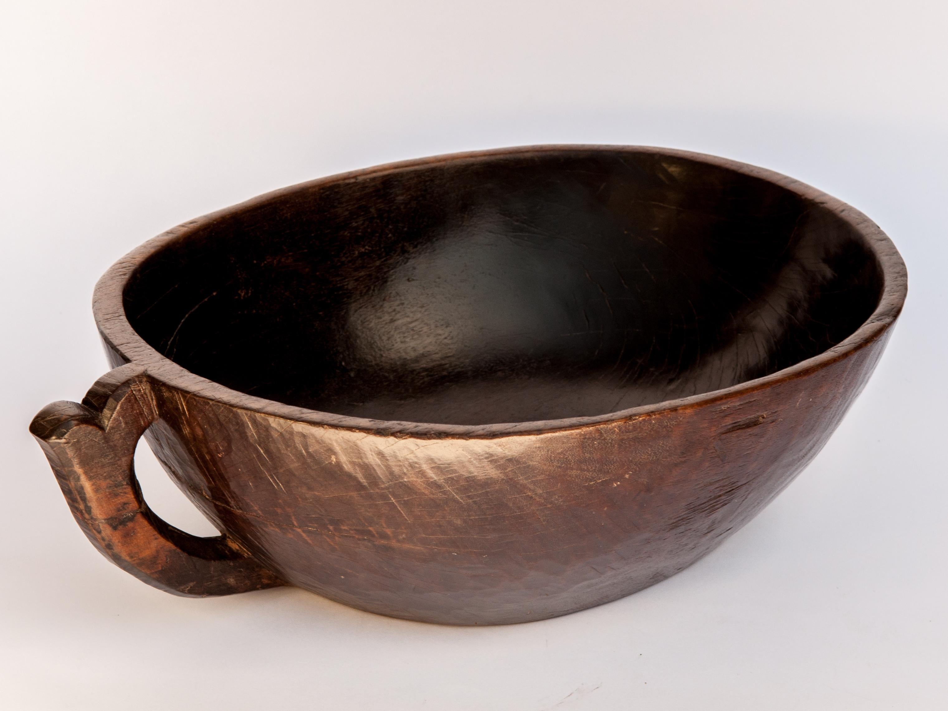 Hardwood Hand Hewn Wooden Bowl with Handle from Sulawesi, Indonesia, Mid-20th Century