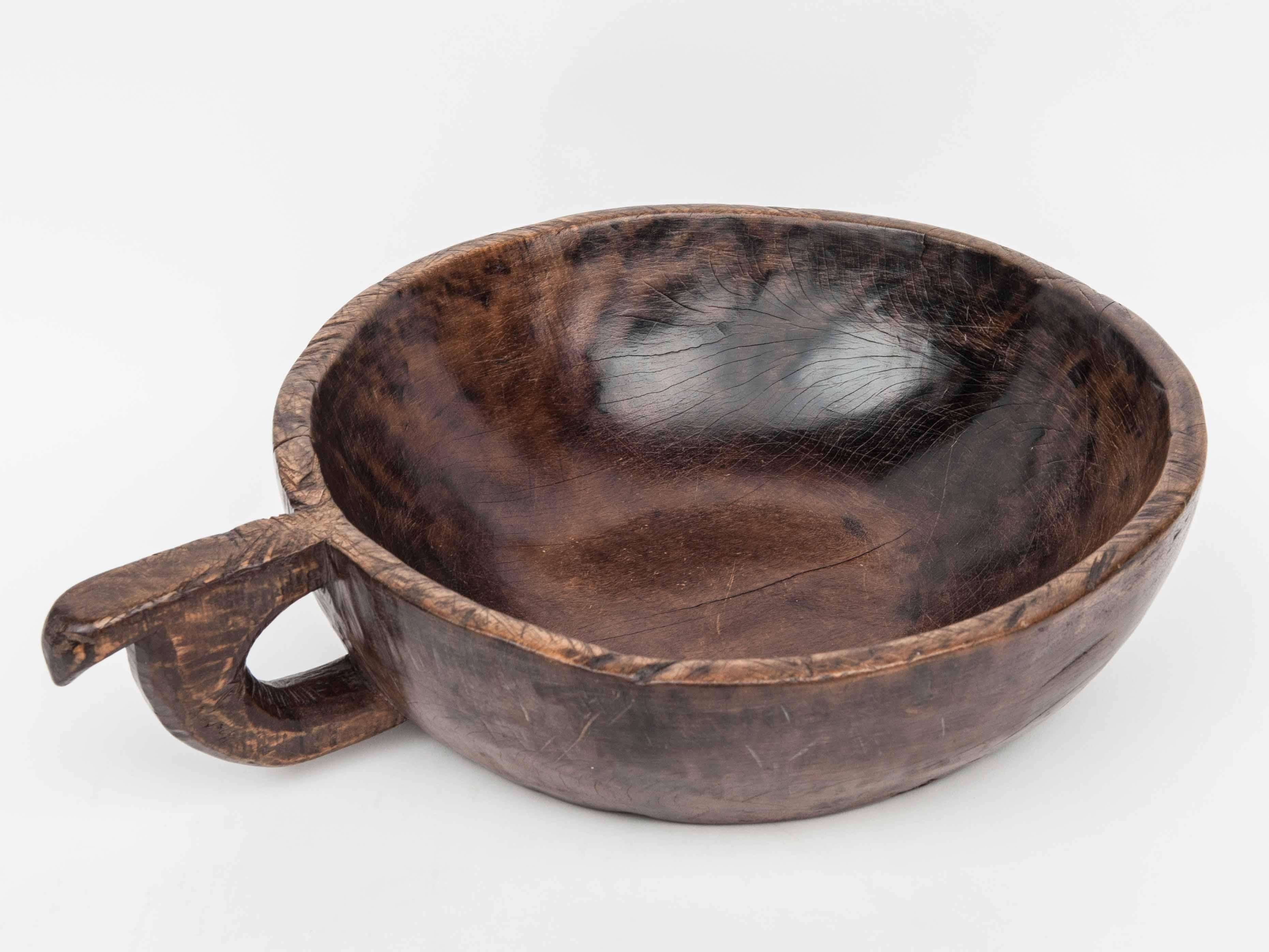 Tribal Hand Hewn Wooden Bowl with Handle Sulawesi, Indonesia. Mid-Late 20th Century