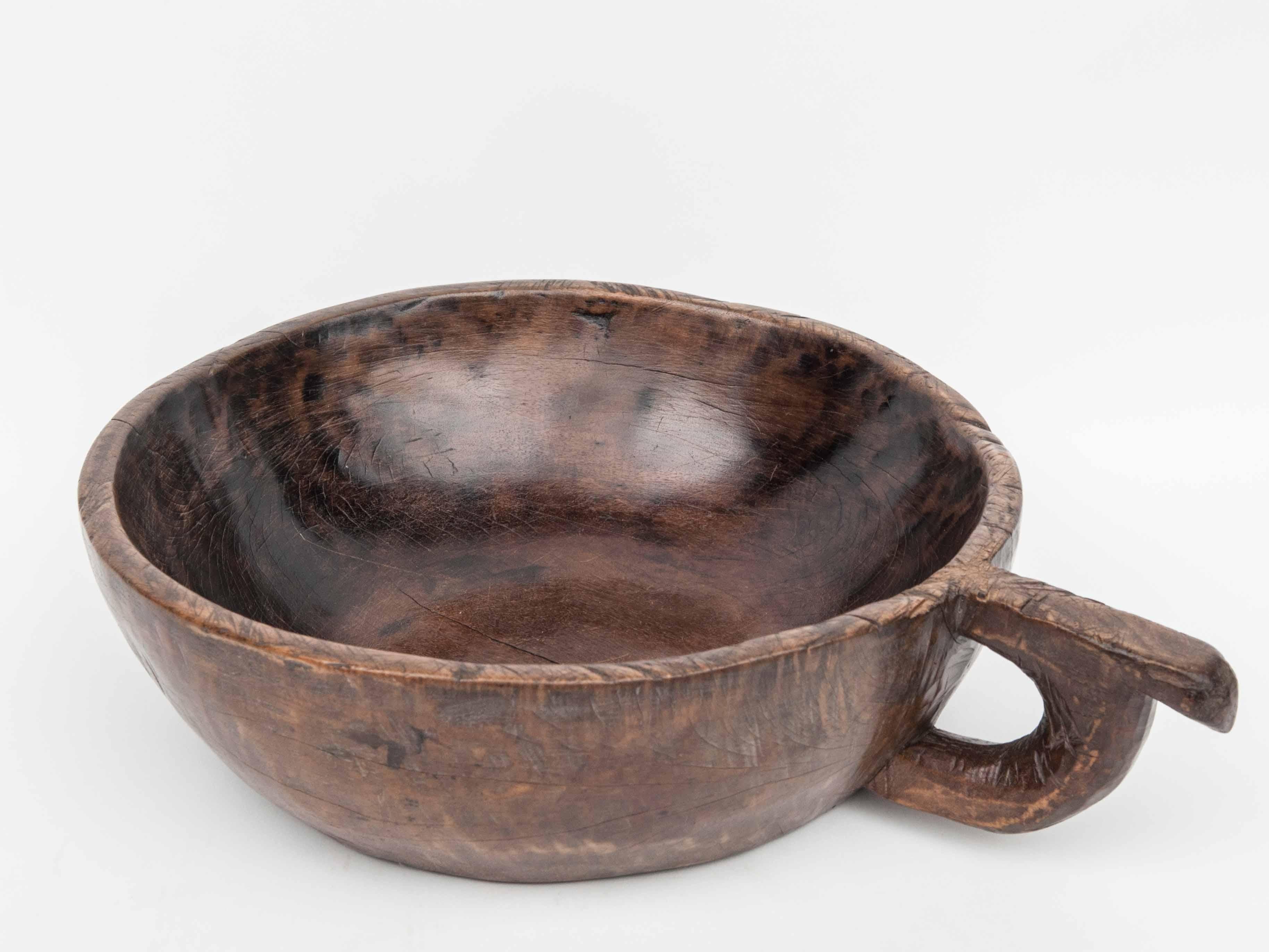 Indonesian Hand Hewn Wooden Bowl with Handle Sulawesi, Indonesia. Mid-Late 20th Century