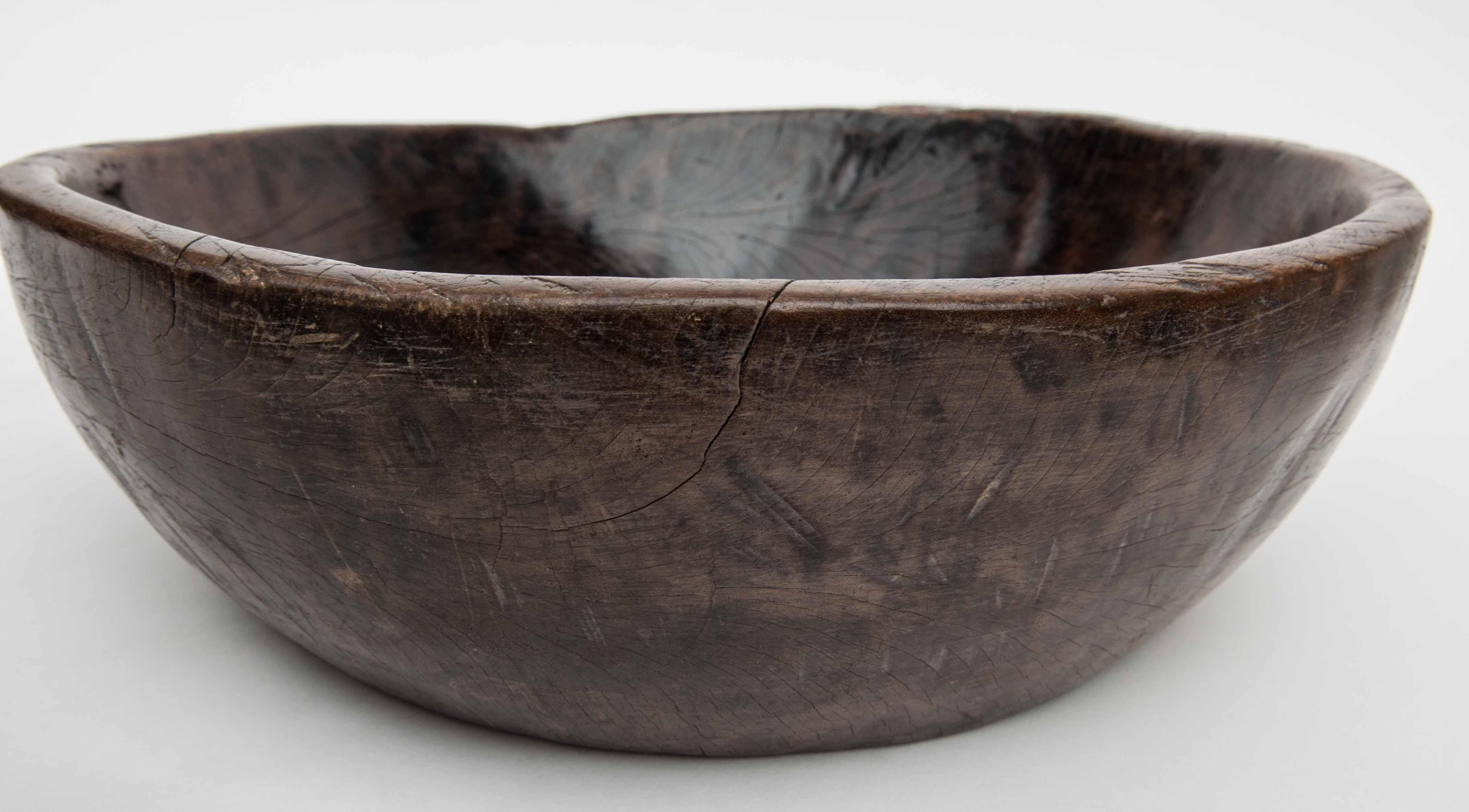 Hand-Carved Hand Hewn Wooden Bowl with Handle Sulawesi, Indonesia. Mid-Late 20th Century