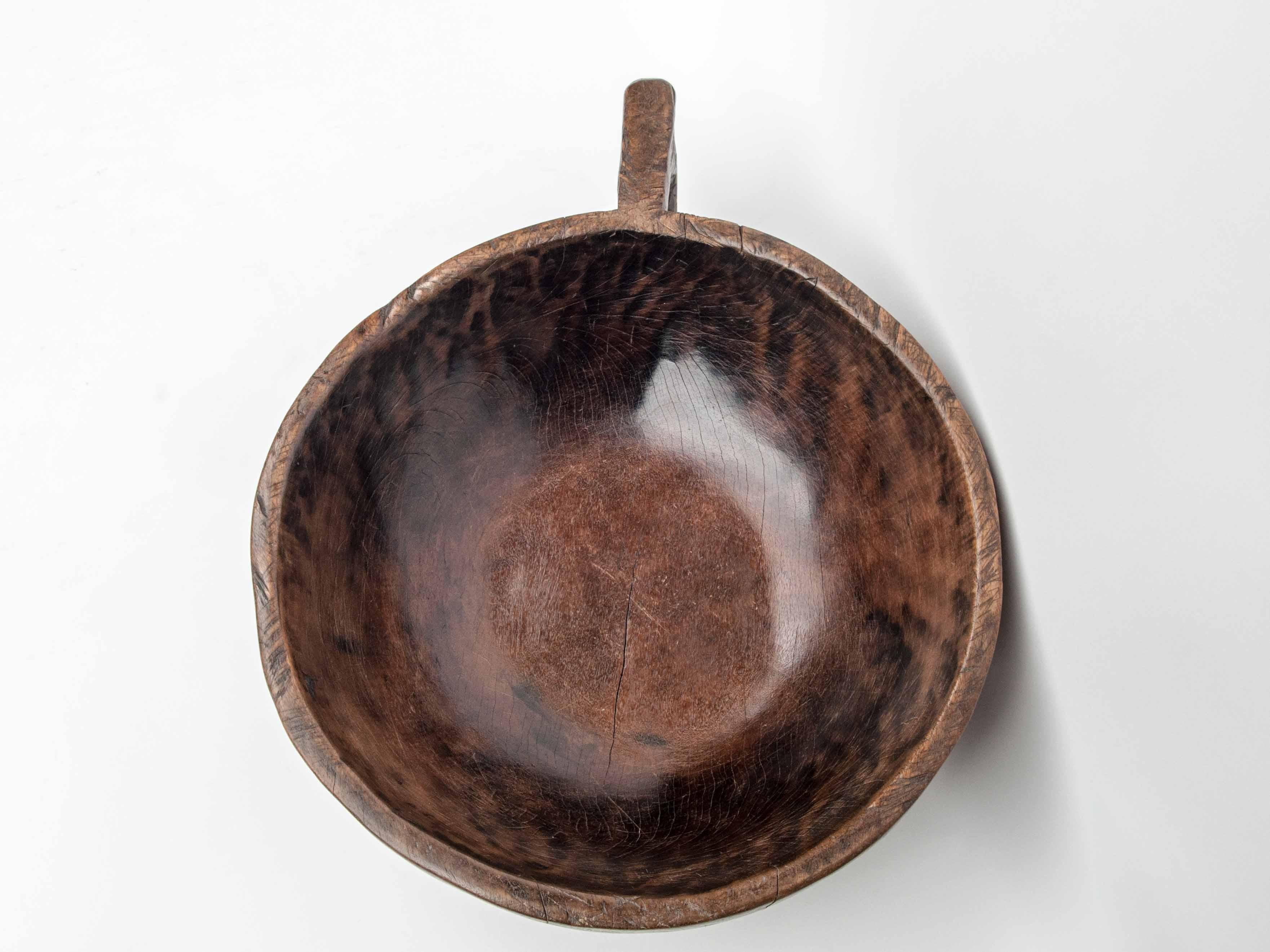 Hand Hewn Wooden Bowl with Handle Sulawesi, Indonesia. Mid-Late 20th Century 1