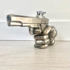 Hand Holding Gun Lighter in Original Box, 1986 Japan