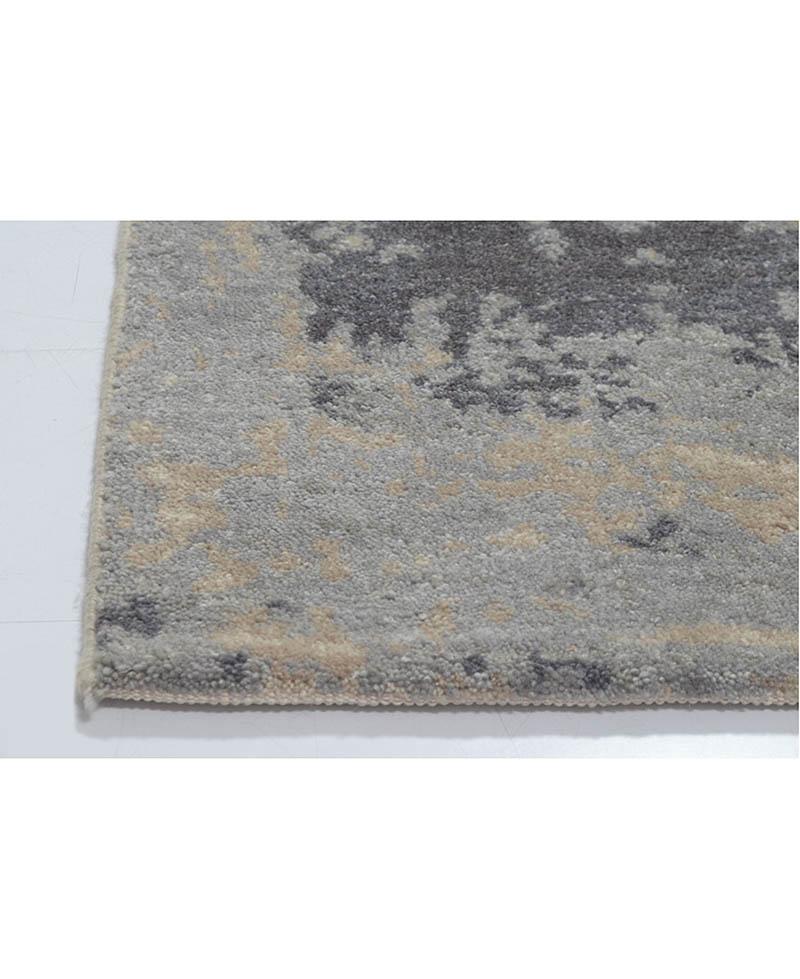 Immerse your space in sophistication with our Hand-Knotted 100% Wool Abstract Art Tan Grey Rug, generously sized at 8'x10'. Crafted with meticulous care, this rug showcases the artistry of hand-knotting, ensuring both durability and a luxurious feel