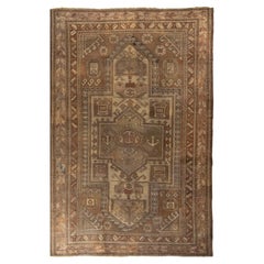 Handgeknüpfter antiker Teppich aus dem 19. Jahrhundert mit braunem Medaillonmuster von Teppich & Kelim