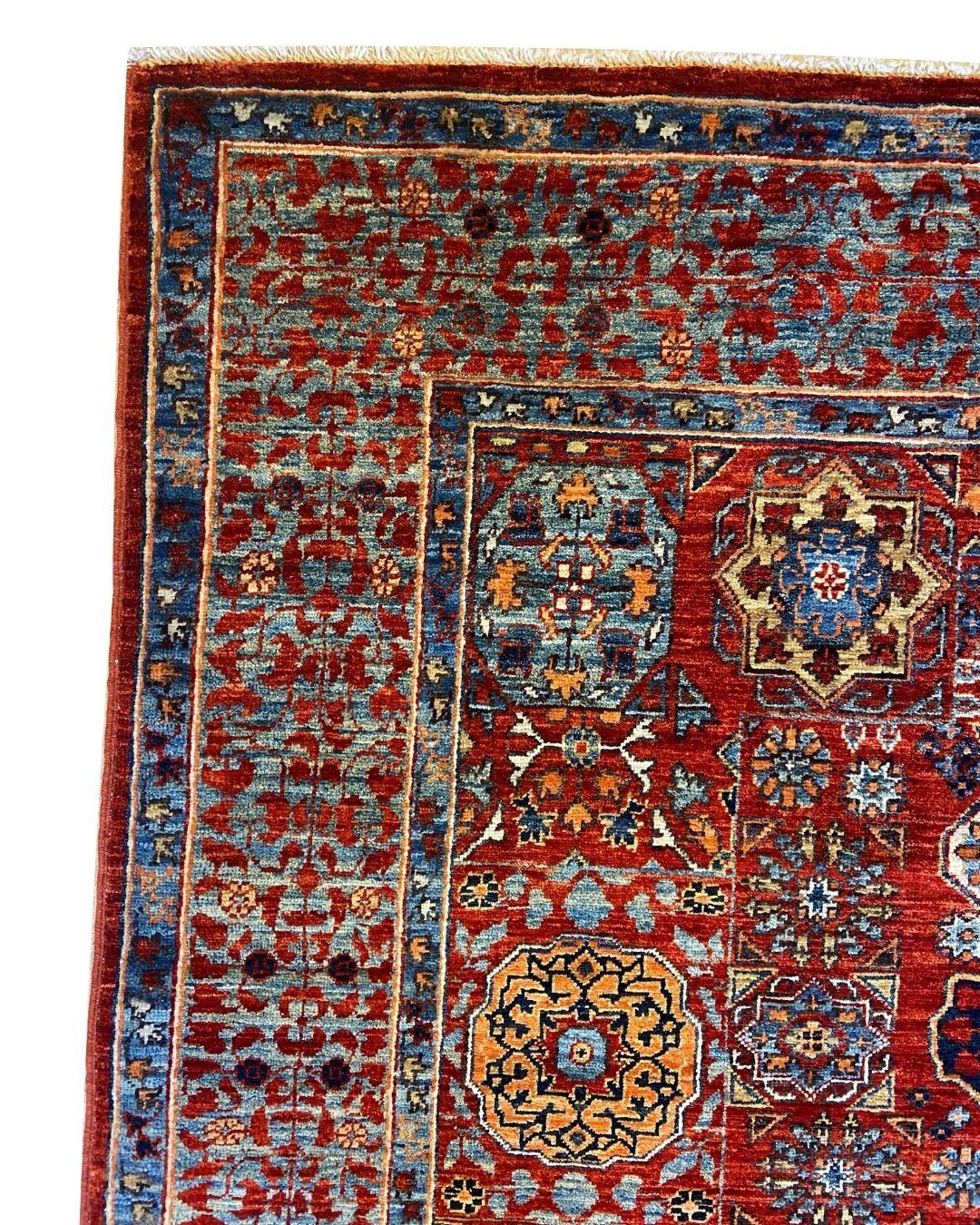 Afghan Tapis afghan 4' x 6' noué à la main avec motif de médaillon en laine rouge et indigo en vente