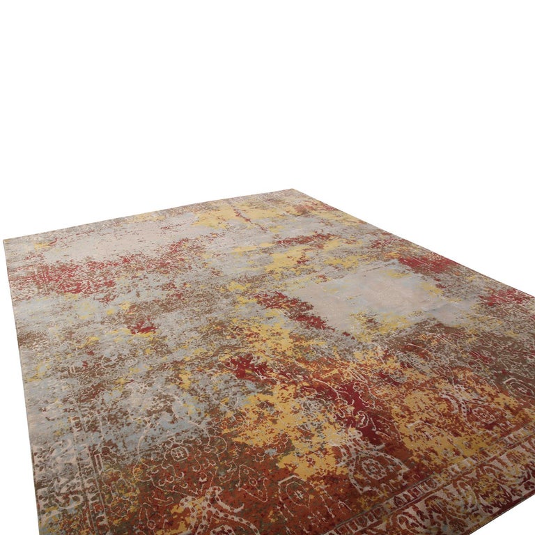 Handknotted in wool, a 6x11 contemporary scale from Rug & Kilim New & Modern rug collection enjoying an abstract pattern in maroon, tangerine orange, canary yellow juxtaposed by blue/gray tints complementing the distress style of this line.