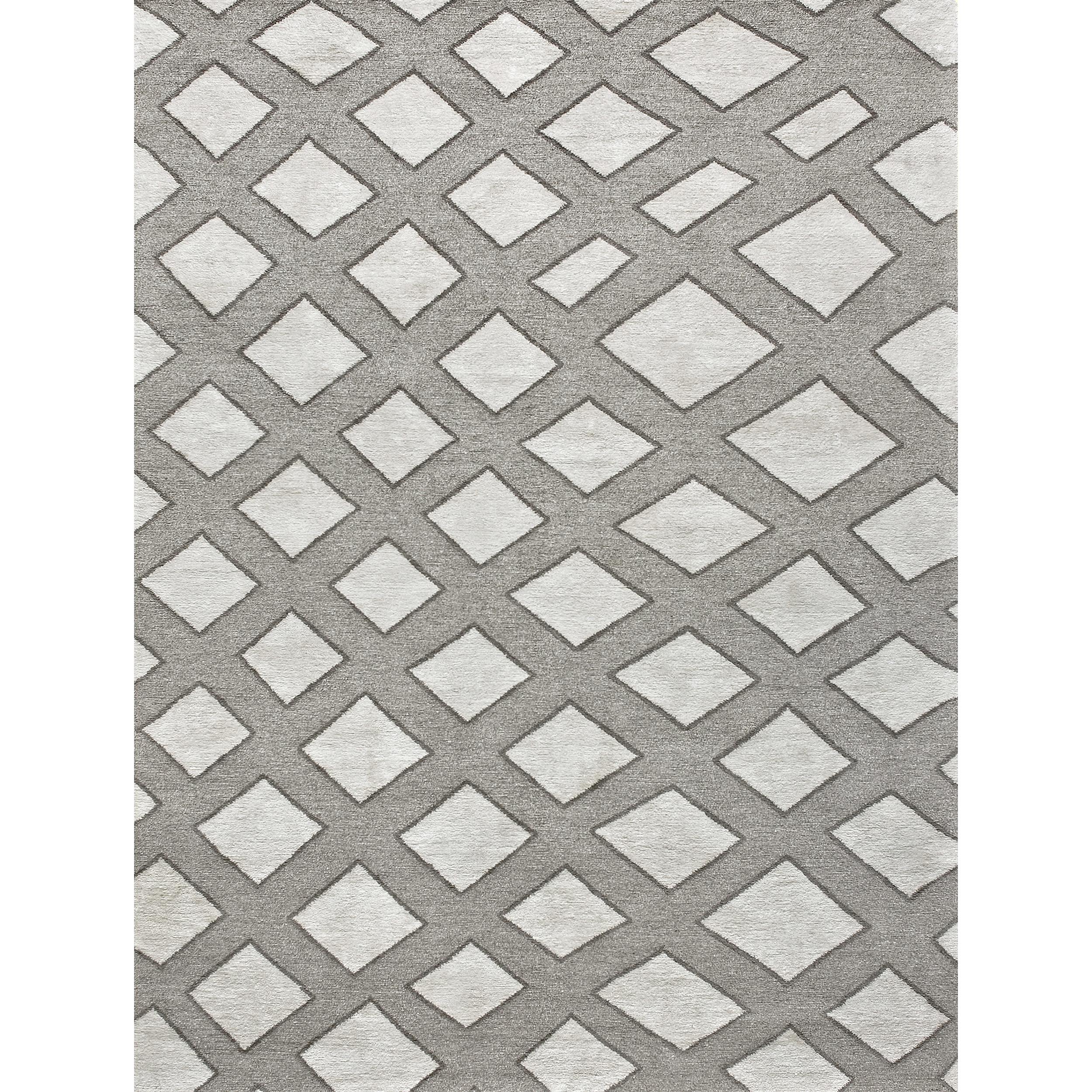 Every inch of this rug is a labor of love, meticulously hand-knotted by skilled artisans in Nepal. The design reflects a modern, abstract motif, which gracefully merges with timeless aesthetics. It blends traditional craftsmanship with contemporary