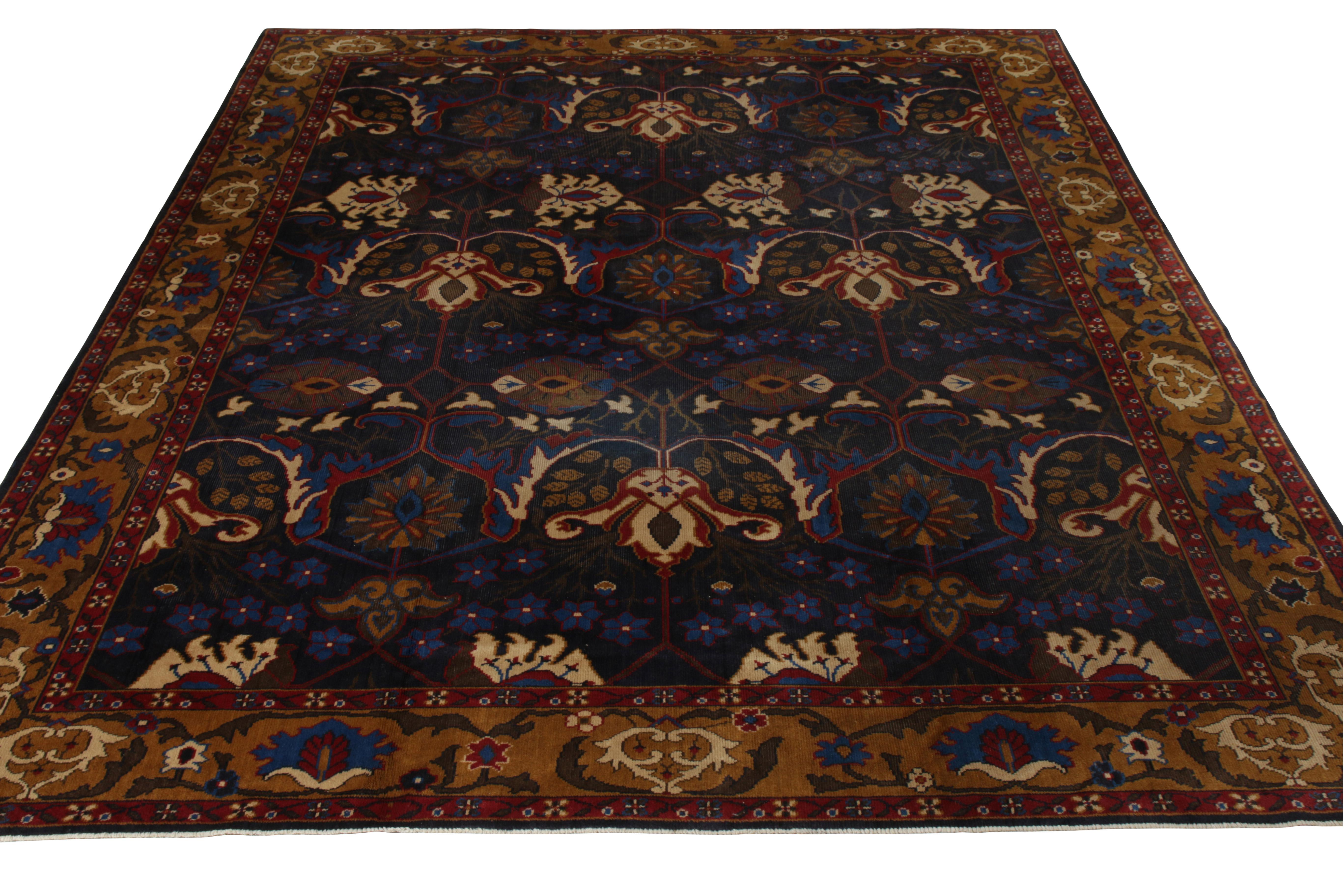 An antique 10 x 13 Agra rug of regal gold and blue, hand knotted in wool originating from India circa 1910-1920. 

On the design: The interesting stylistic sensibility in the floral patterns may connote inspiration from celebrated Bidjar rugs of