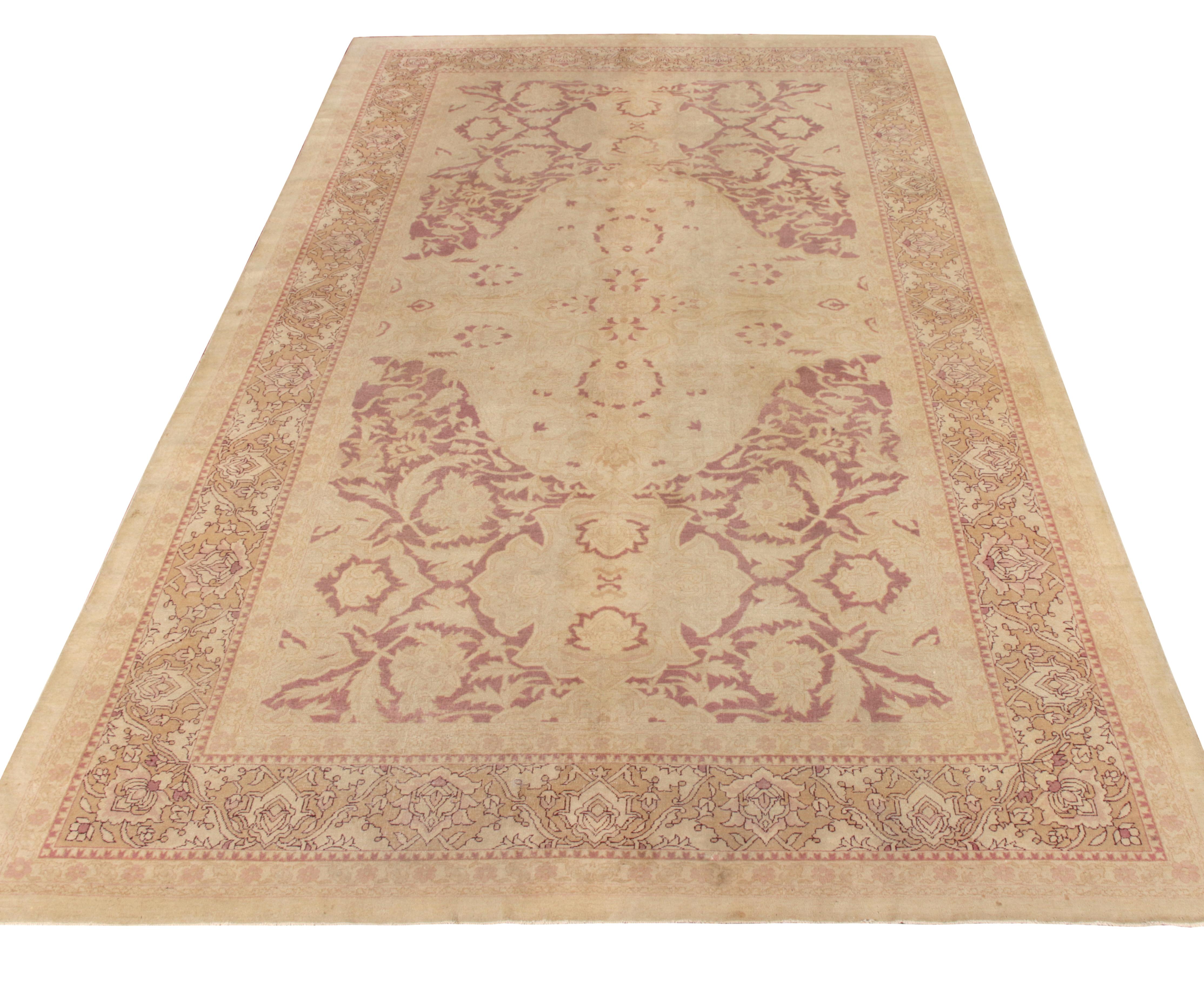 An antique 9 x 15 Amritsar rug masterpiece joining Rug & Kilim’s distinguished antique collection. Hand knotted in wool from India circa 1920–1930, the rug celebrates the unique “jail rug” medallion style in elegant-yet-forgiving pink and