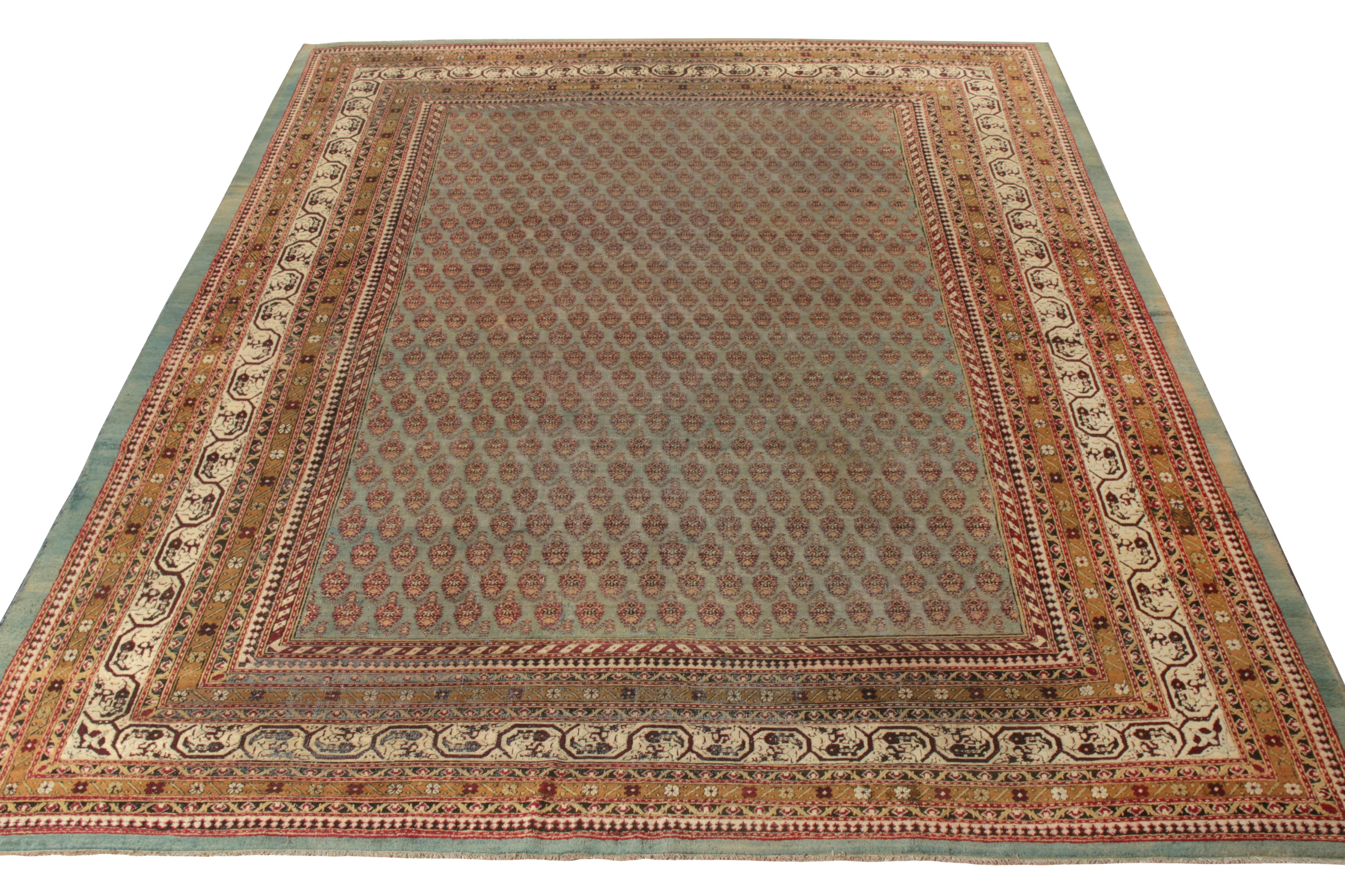 Hand knotted in fine quality wool, this antique 9x12 Amritsar rug originates from India circa 1920-1930. Enjoying the classic sensibilities of the finest Indian workshops, the rug displays an exemplary show of floral imagination that expresses