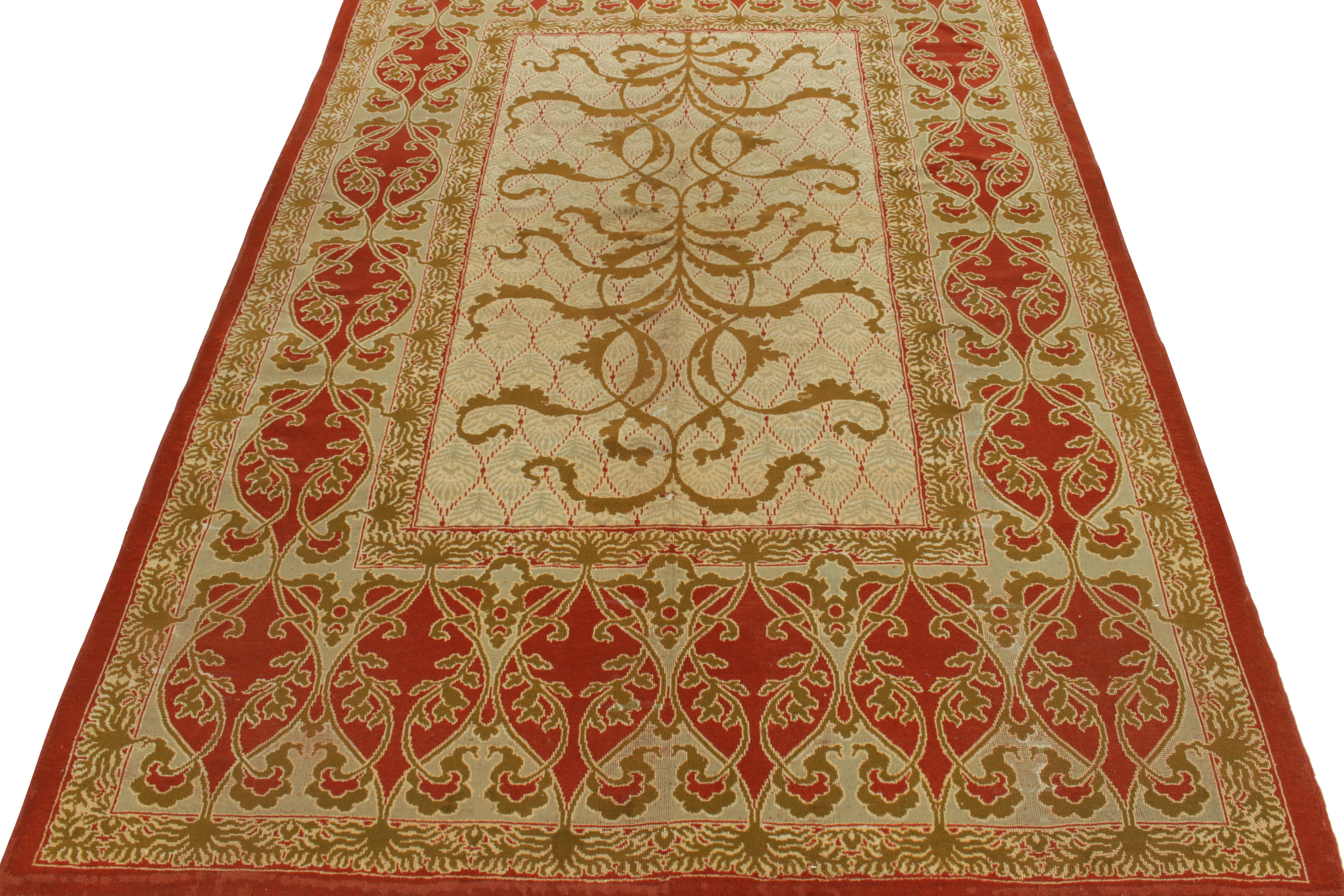 Hand-knotted in wool circa 1920-1930, Rug & Kilim boasts this 7x11 antique European Art Nouveau rug making a grand entry to their coveted Antique & Vintage collection. The rug embraces transitional aesthetics of the 1920s—most likely originating