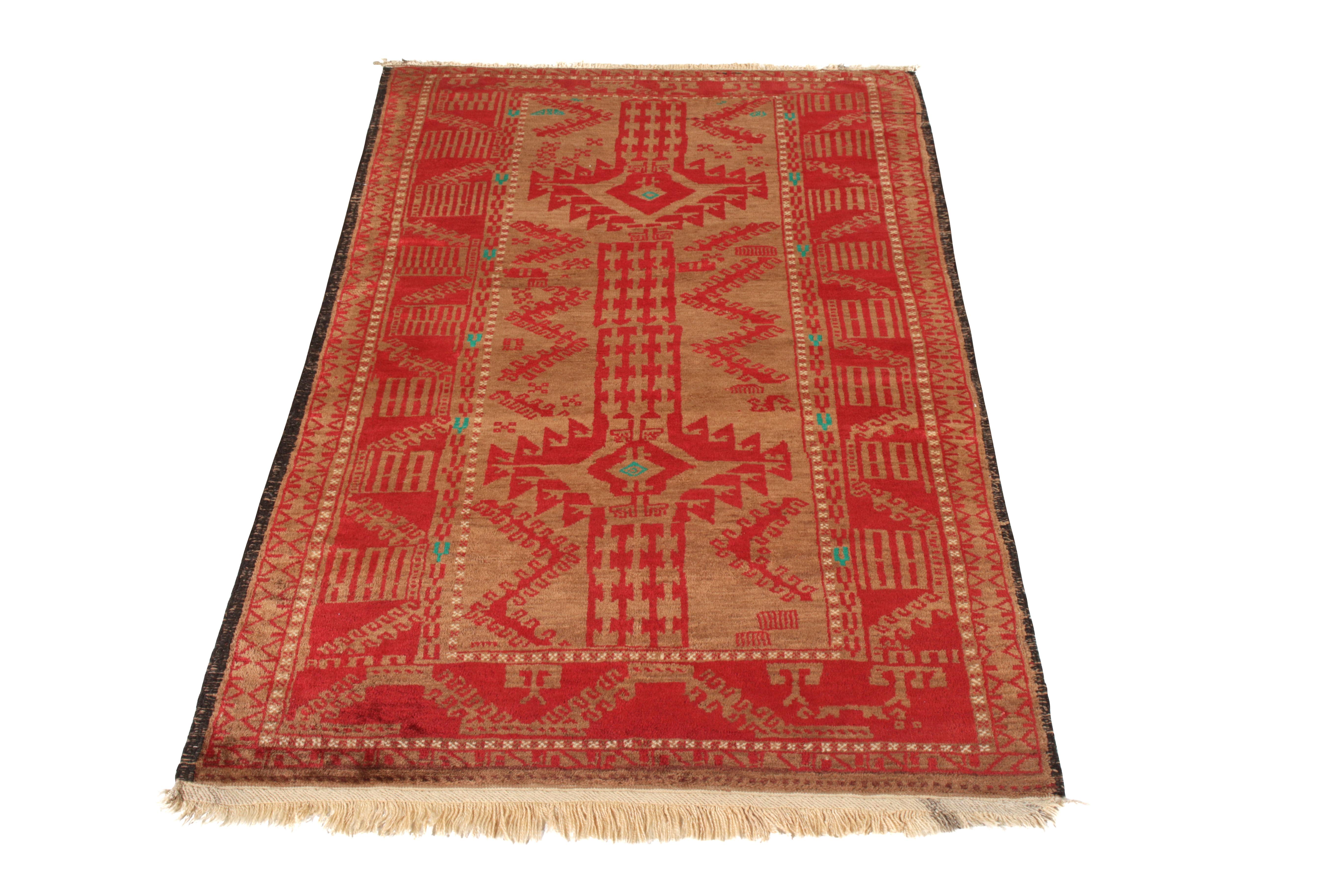 Hand-knotted in wool originating circa 1890-1900, this antique Persian rug connotes a transitional Baluch rug design, offering a rich red and beige-brown colorway pallet in a versatile 3x6 size among its cultured and distinctive features enjoyed in