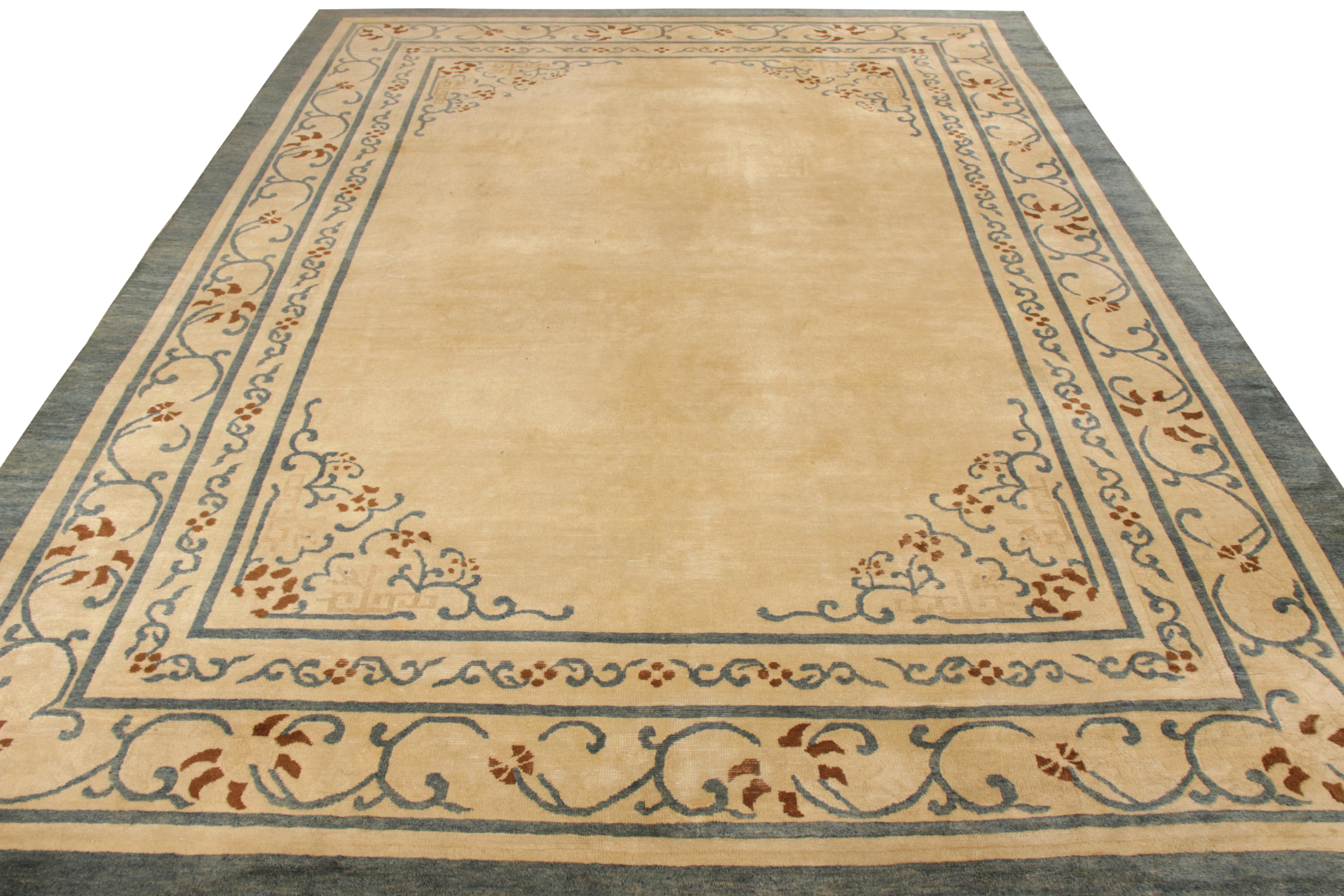 Hand knotted in wool, a fabulous Peking rug from Rug & Kilim’s Antique & Vintage Collection. A lavish 9x12 scale originating from China circa 1920-1930, the rug witnesses an open field encased in a sophisticated floral border. The design marries a