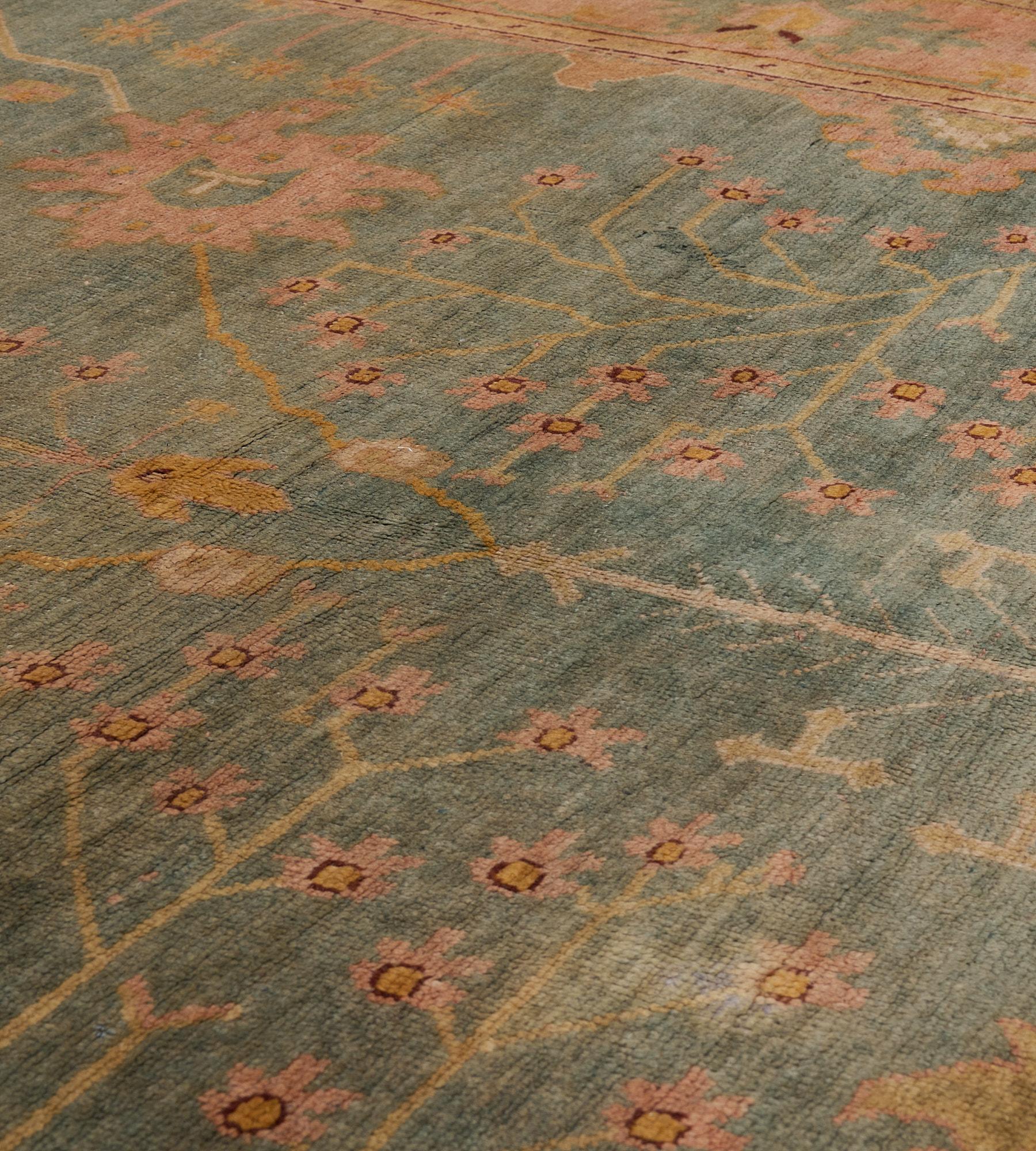 Wool Hand-Knotted Antique Circa-1880 Floral Oushak Rug For Sale