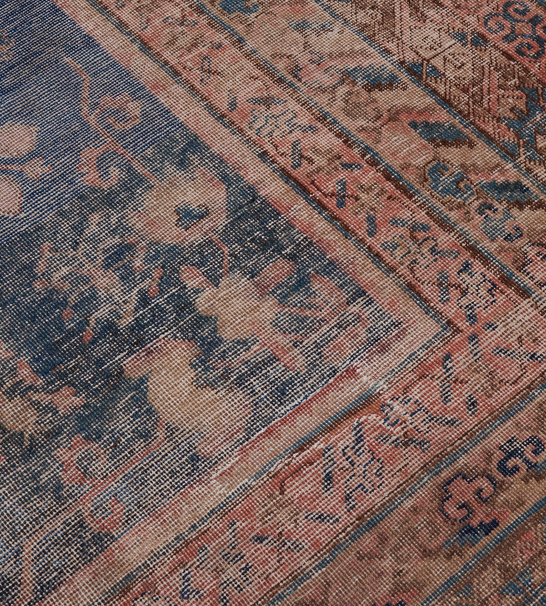 Hand-knotted Antique Circa-1880 Wool Khotan Indigo-Blue Floral Rug In Good Condition For Sale In West Hollywood, CA
