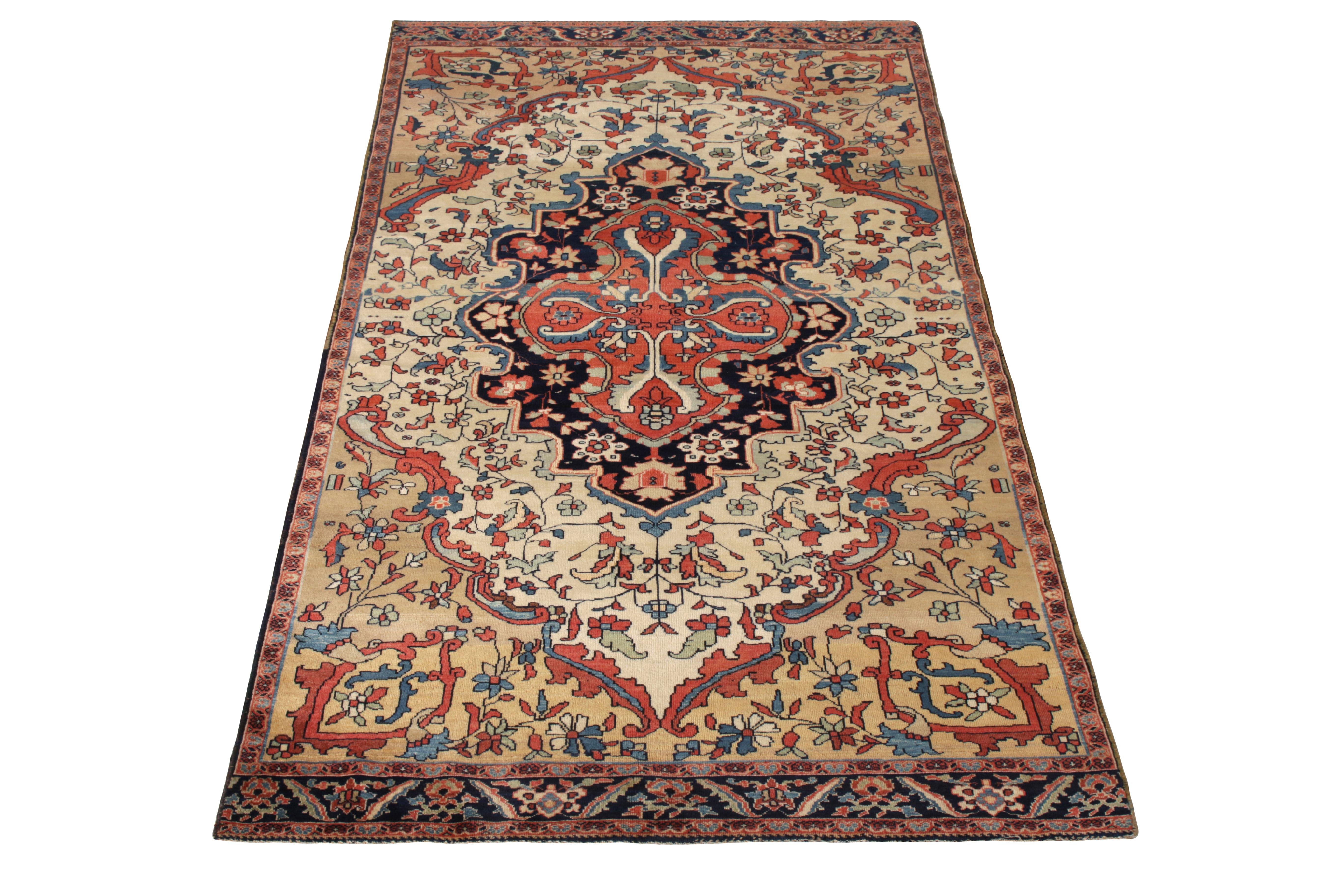 Hand-knotted in wool originating circa 1890-1900, this 3 x 7 antique Persian runner connotes a late 19th century Farahan rug design, depicted in this elegant medallion pattern in intricate red, green, and blue hues against a comfortable beige-brown
