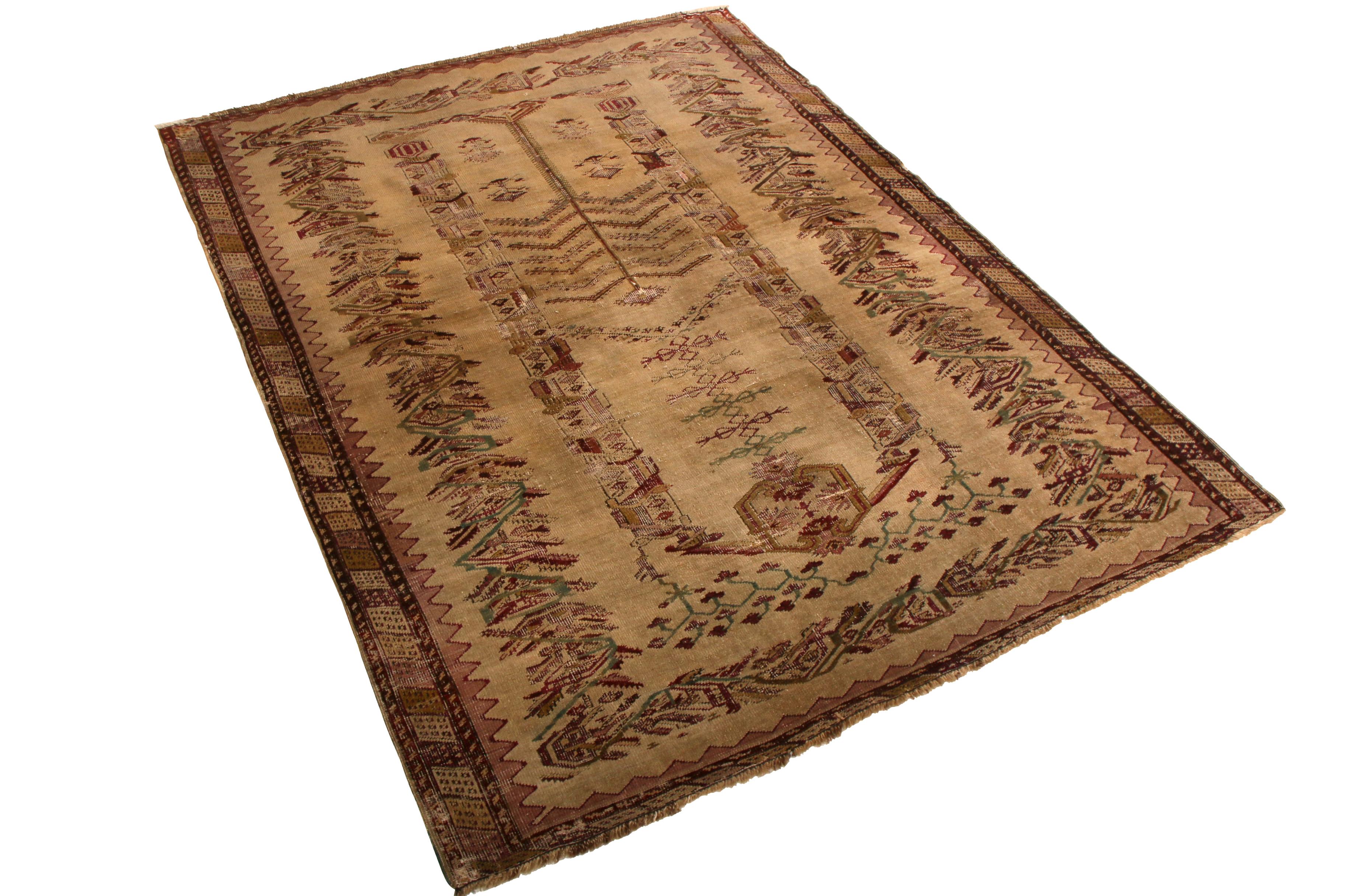 Hand knotted in wool between 1910-1920 from the titular Anatolian region of Turkey, this antique Ghiordes rug enjoys allusions to the Mihrab and tree of life symbols, venerated in part for the unique variations between individualistic rugs of this
