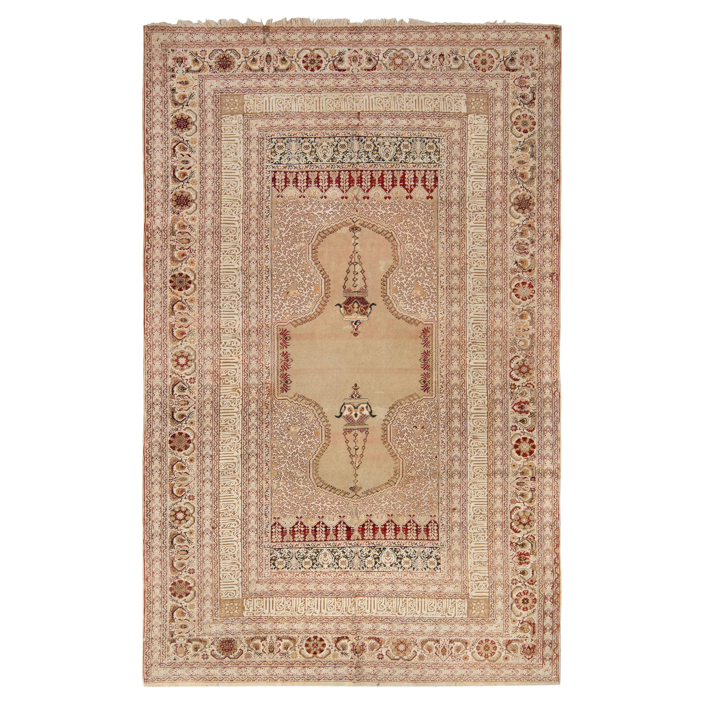 Tapis Ghiordes ancien noué à la main à motifs floraux beige-marron par Rug & Kilim