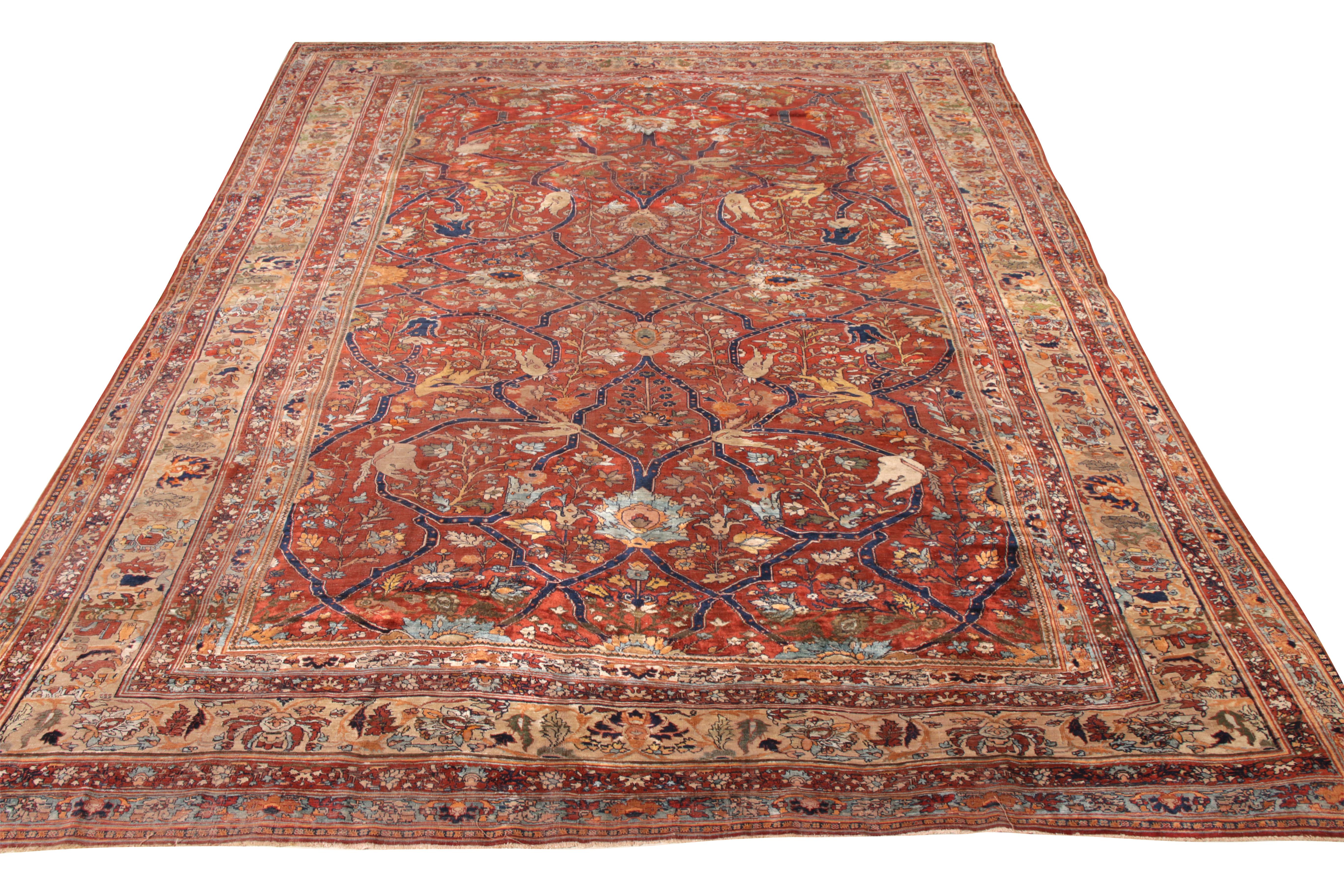 Enjoying the artistic vision of one of the finest German workshops circa 1920-1930, this 8x11 ode to antique Persian Heriz rug styles is a rare piece in its lineage. A graceful piece embodying a dense floral pattern in a bold red blue colourway sets