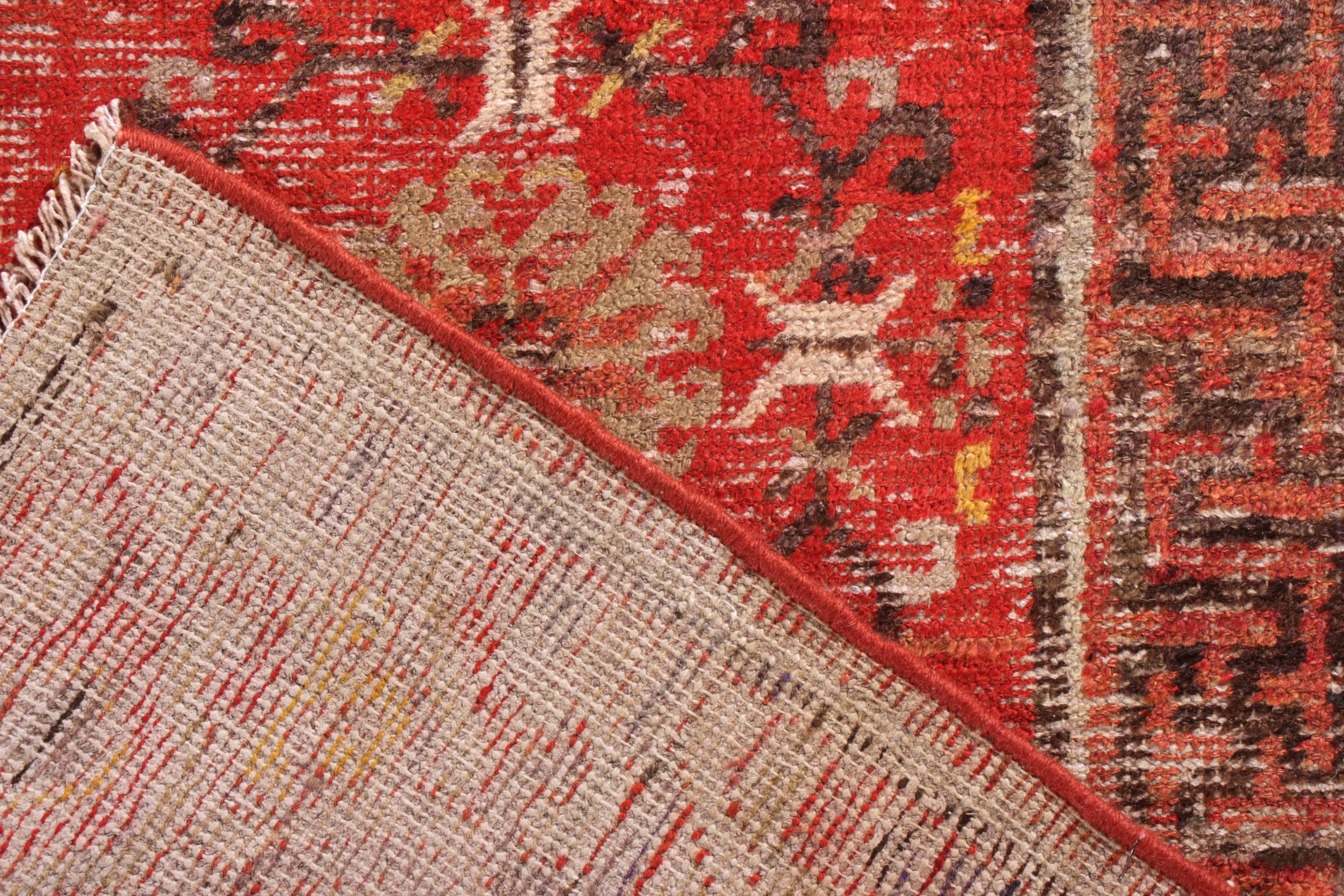 Early 20th Century Hand-Knotted Antique Khotan Rug in Red and Gold with Medallion Patterns