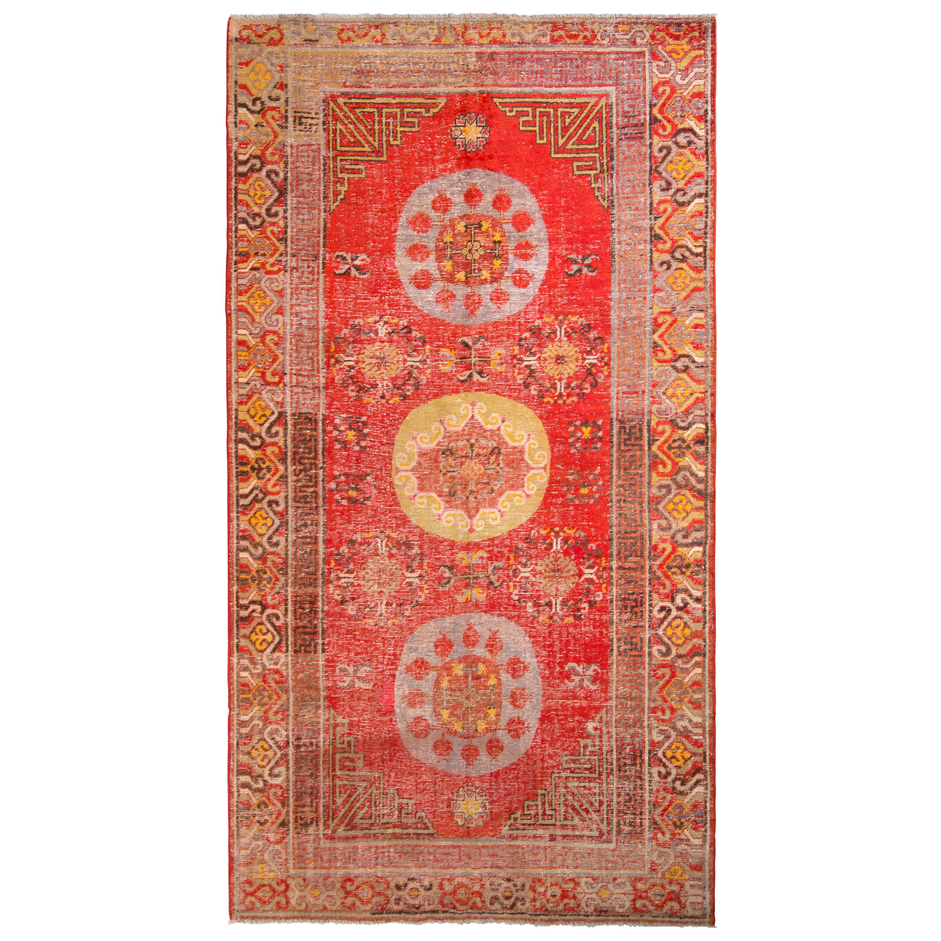 Hand-Knotted Antique Khotan Rug in Red and Gold with Medallion Patterns