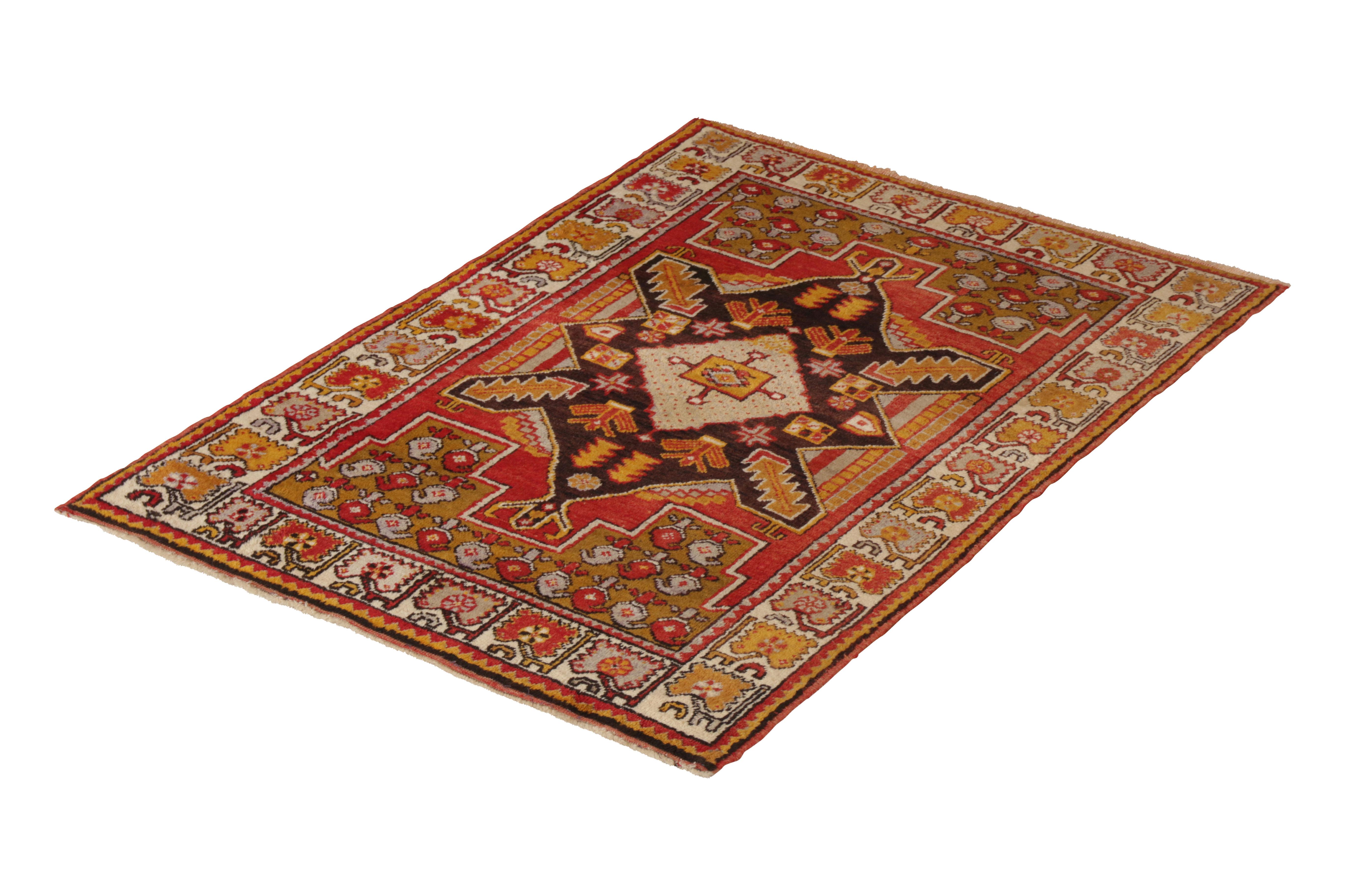 Hand knotted in wool originating from Turkey circa 1910-1920, this antique rug connotes a transitional Kirsehir rug design, named for the titular tribal rug style birthing intricate beauties like that of this uncommon 3x5 sized Kirsehir rug of rich