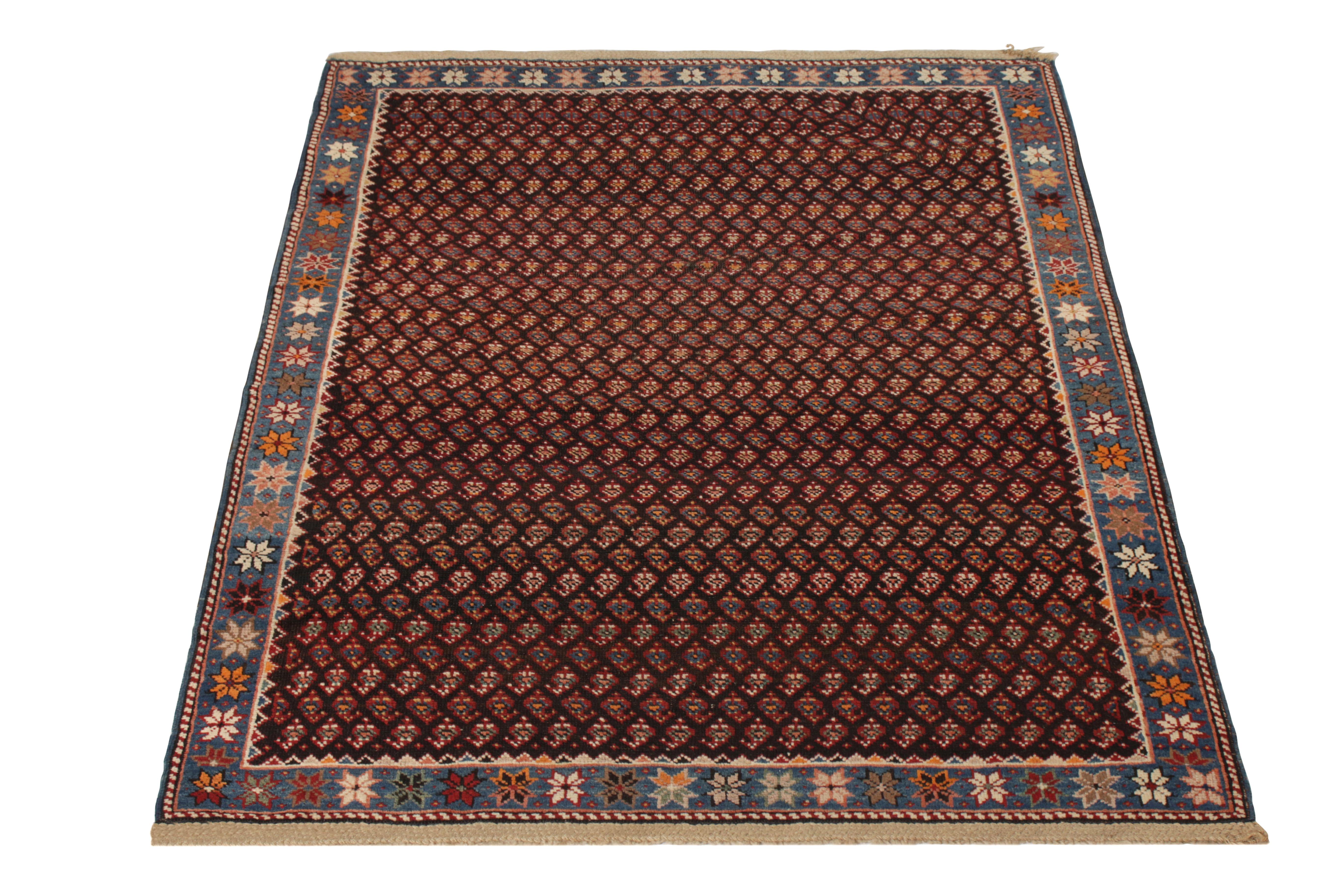Hand-knotted in wool originating from Russia circa 1910-1920, this antique Russian rug connotes a transitional Kuba rug design in notable textural, intricate pile approach with a rare black background, seldom seen in Kuba rugs like this 4x5 and its