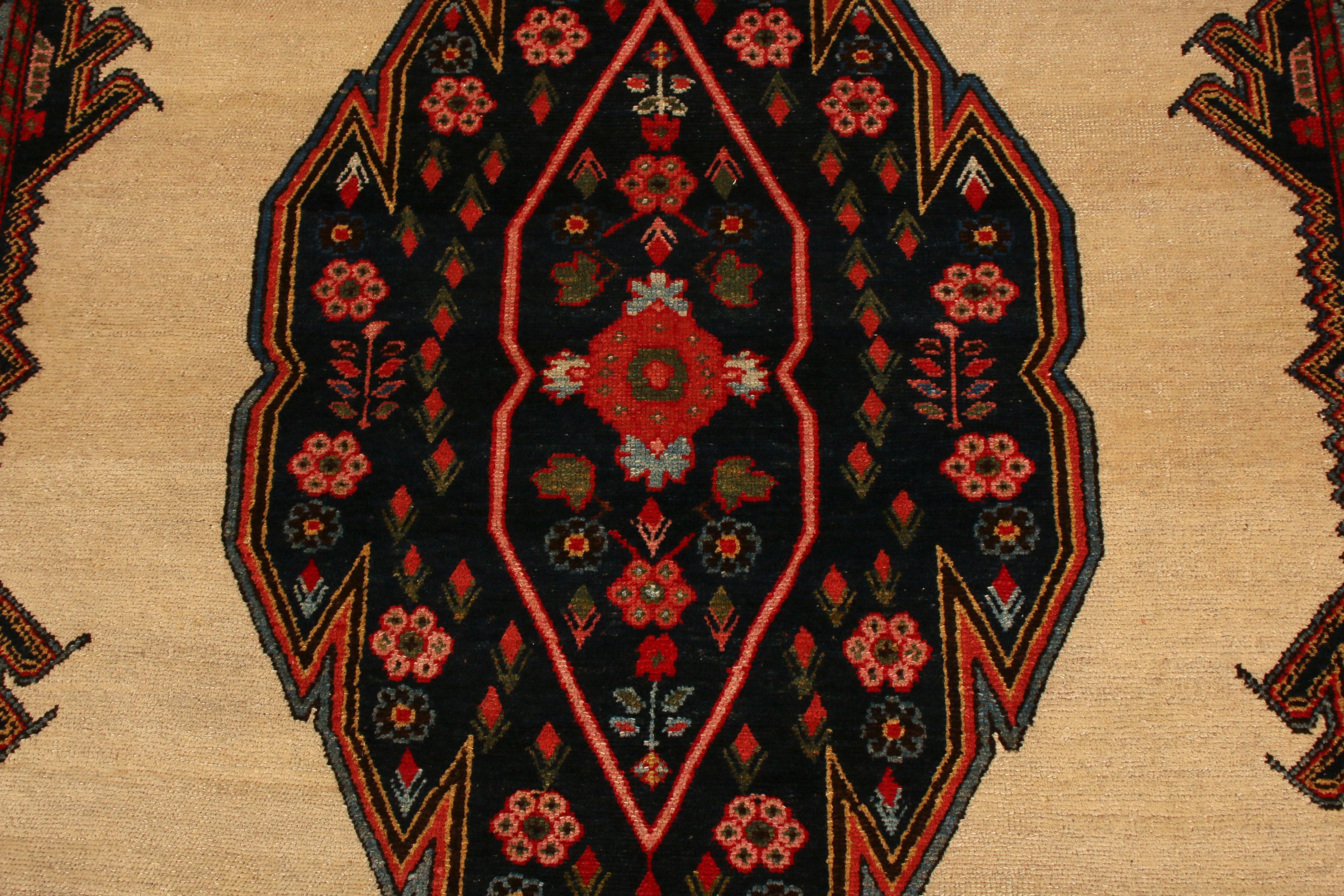 Hand knotted in wool originating circa 1890-1900, this antique Persian rug connotes a classic Mazlaghan rug design—a West Persian lineage known for celebrating medallion patterns like this regal design seldom seen in this rare colorway combination.