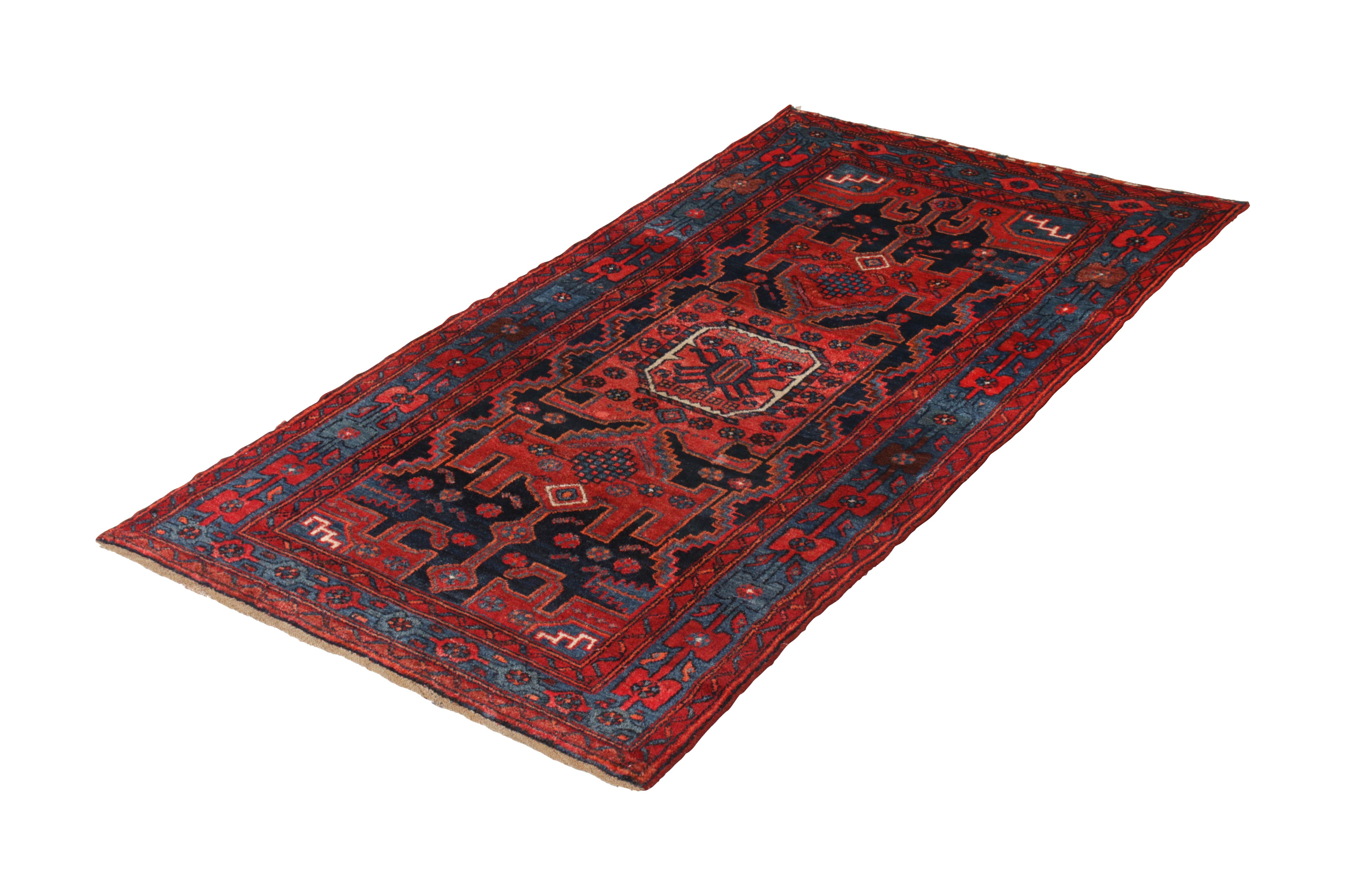 Hand knotted in wool originating circa 1890-1900, this antique Persian rug connotes a traditional Mosul rug design (Musel rug, Mousel rug, etc.) from the celebrated nomadic families of Kurdish and Persian rug making known for these joyful,