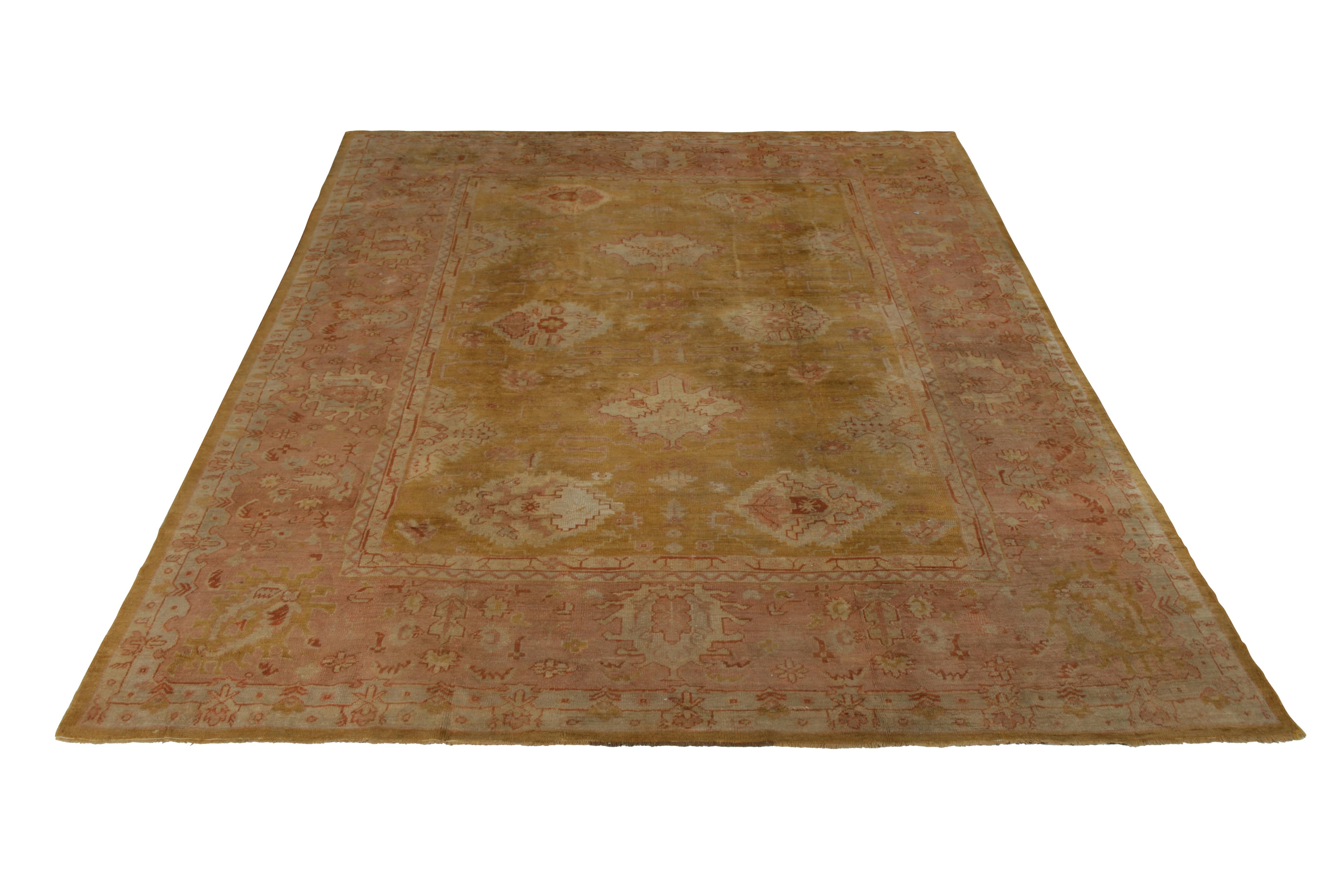An antique 10x13 Oushak rug of magnificent pink and gold, hand knotted in wool originating from Turkey circa 1890-1900. 

On the Design: This particular antique Oushak rug is remarked by Josh as one of the most original and finely woven Oushaks of