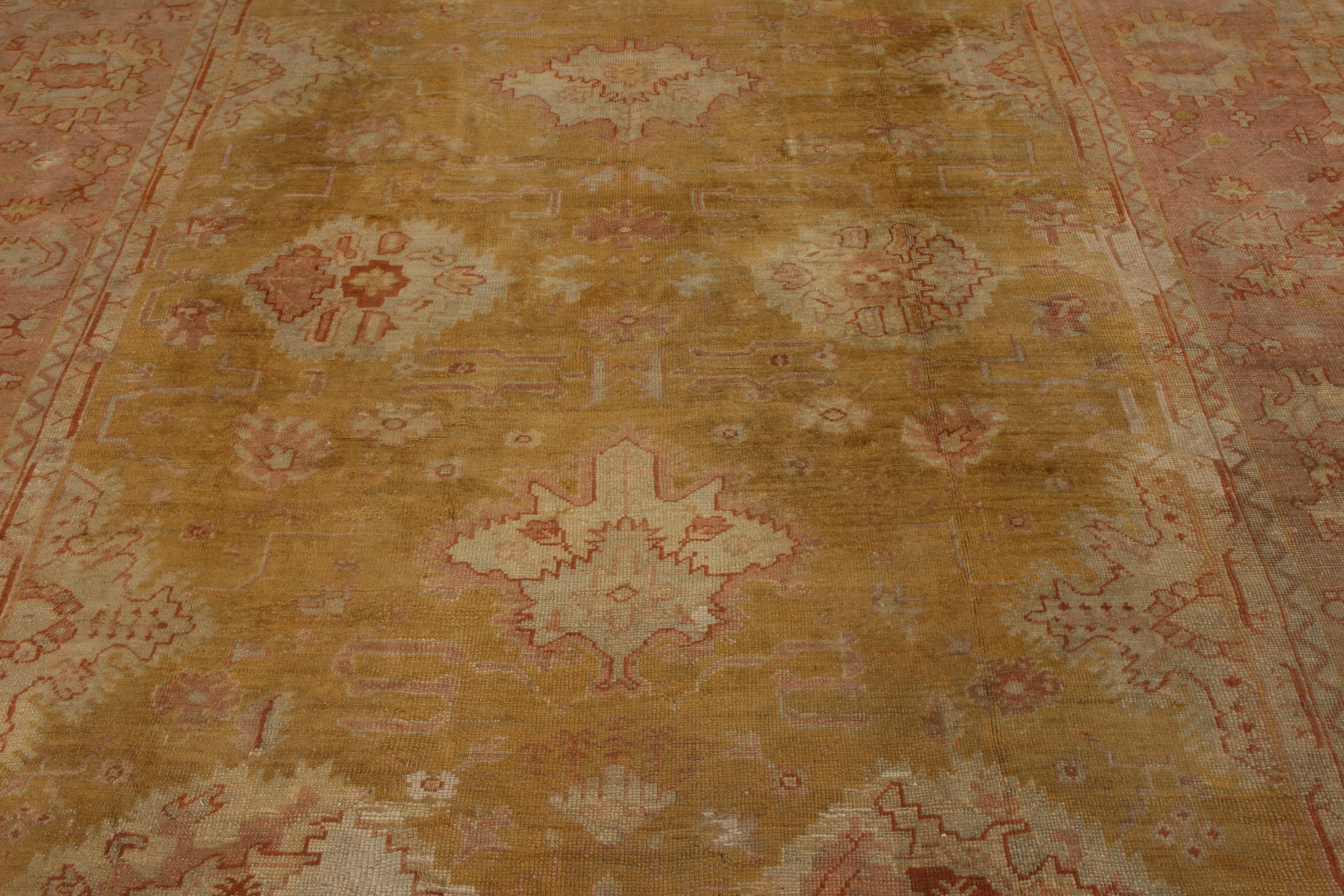 Hand-Knotted Antique Oushak Rug in Gold and Pink Floral Pattern In Good Condition For Sale In Long Island City, NY