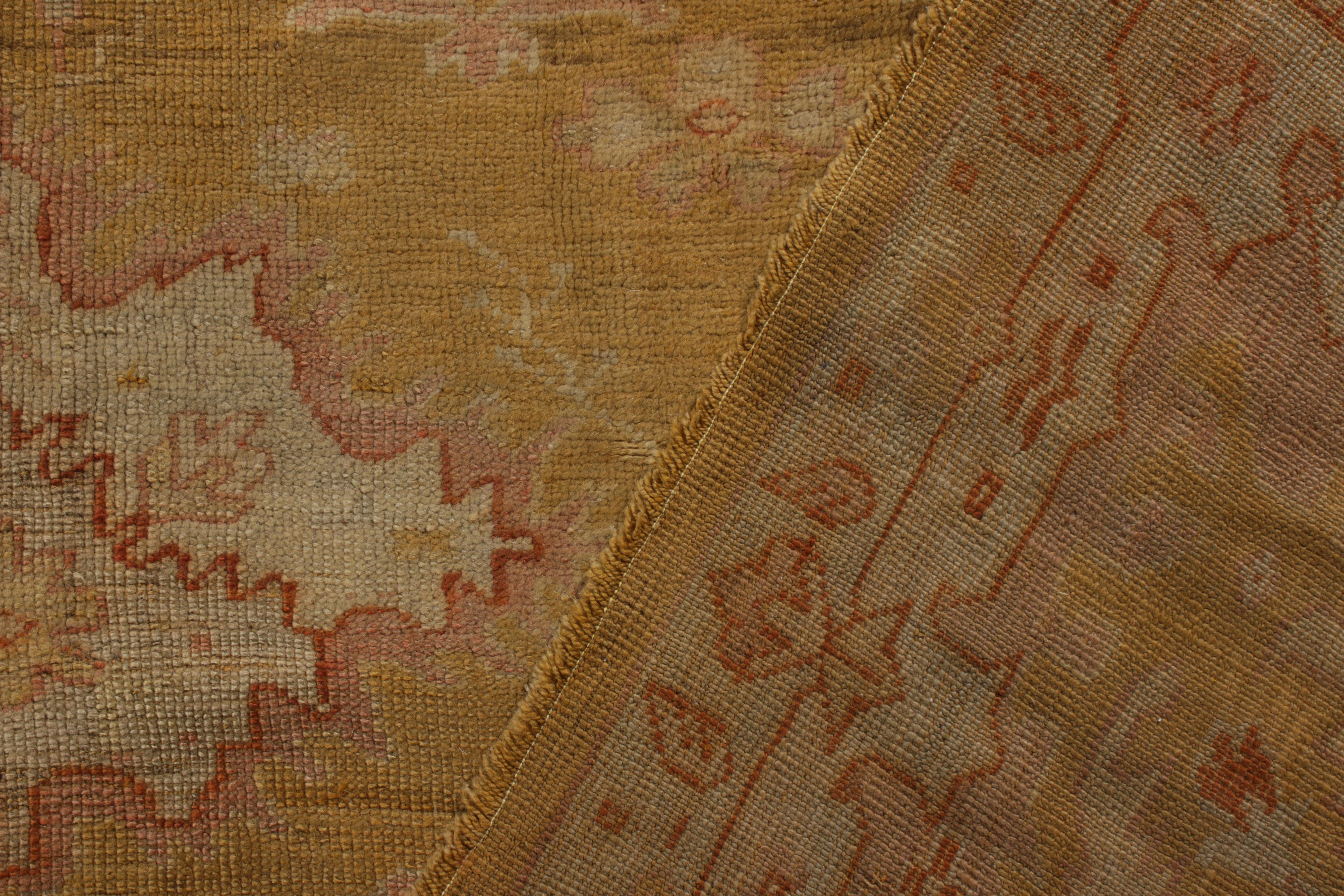 Late 19th Century Hand-Knotted Antique Oushak Rug in Gold and Pink Floral Pattern For Sale