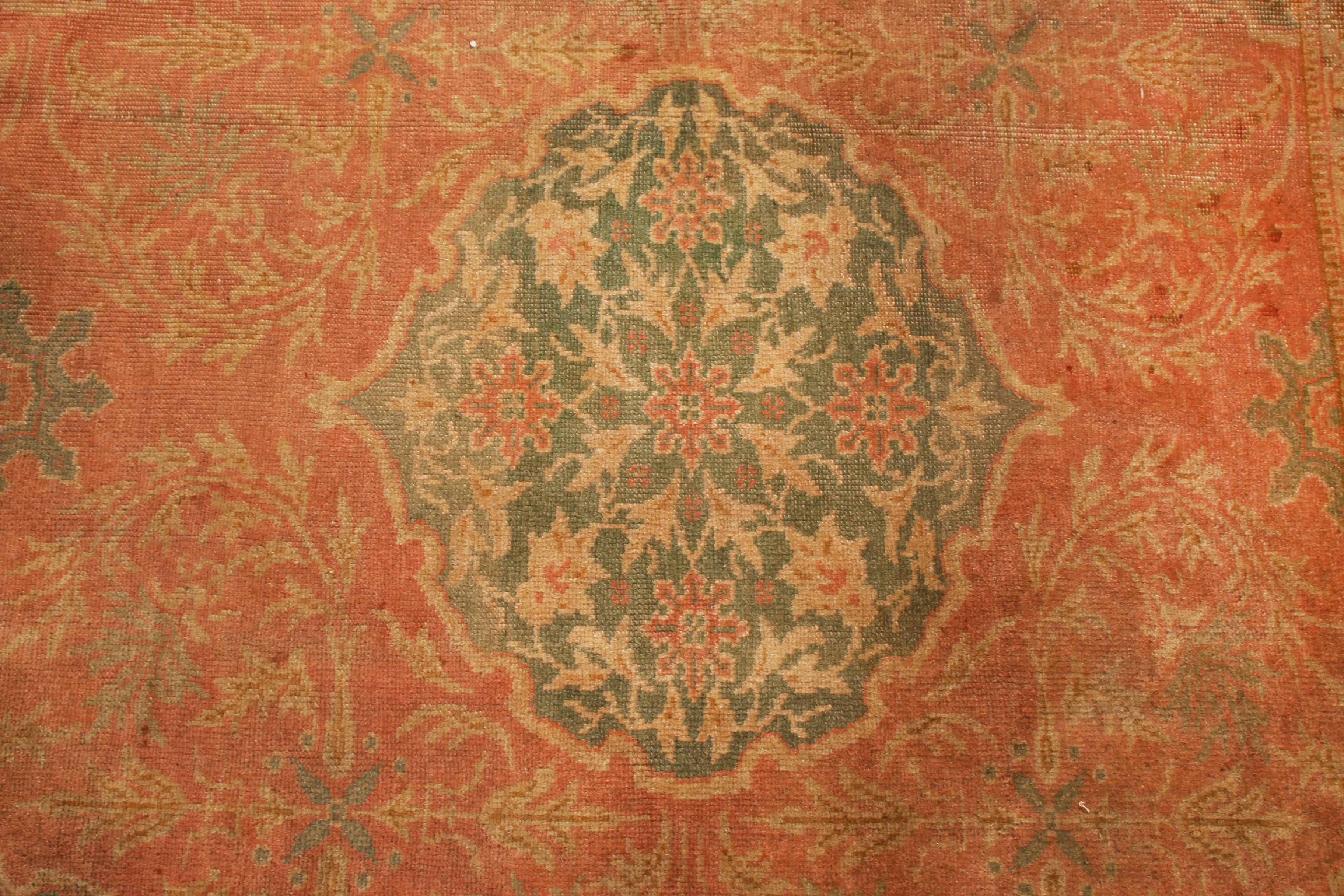 Turkish Hand Knotted Antique Oushak Rug in Red and Green Floral Pattern For Sale