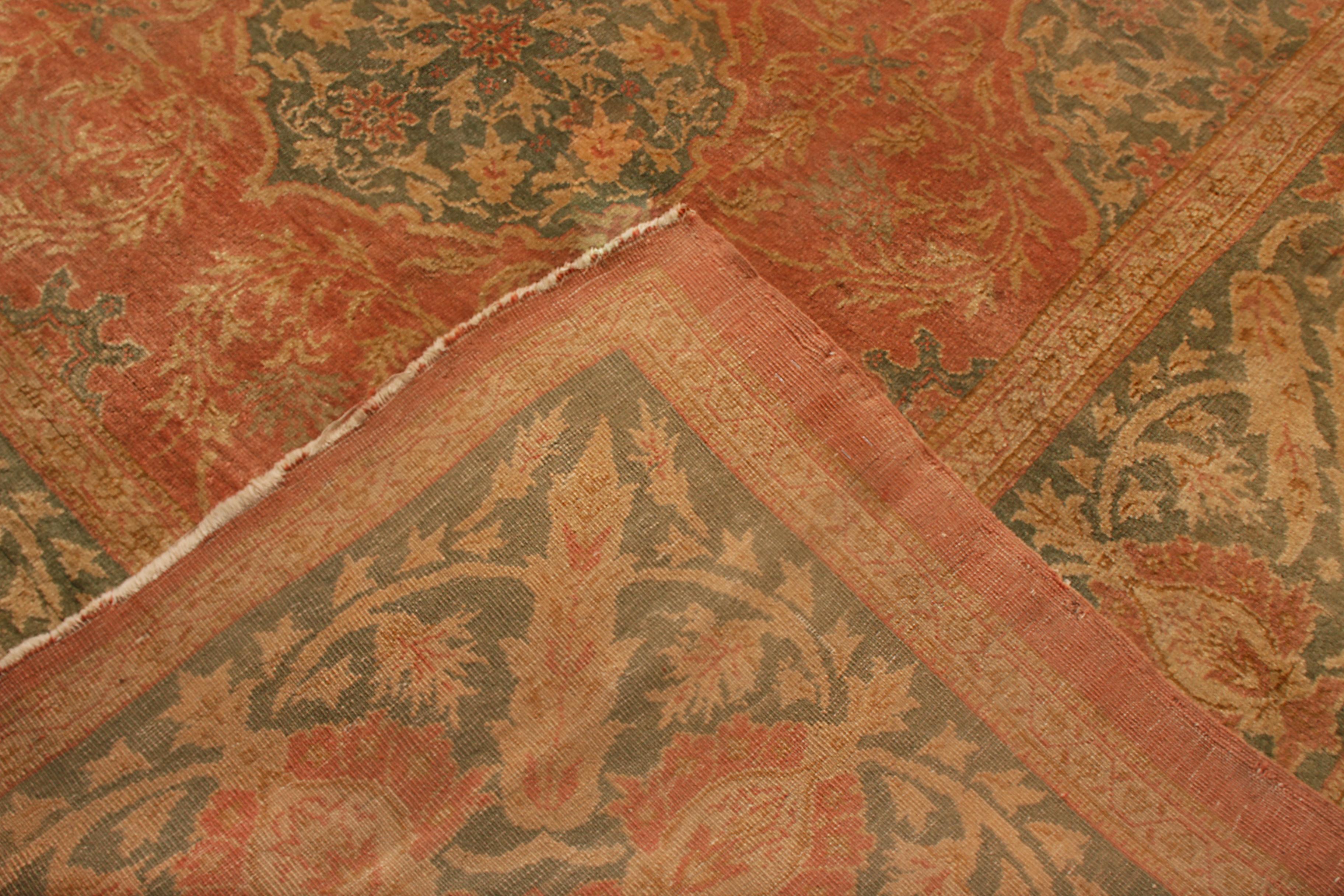 Hand Knotted Antique Oushak Rug in Red and Green Floral Pattern In Good Condition For Sale In Long Island City, NY