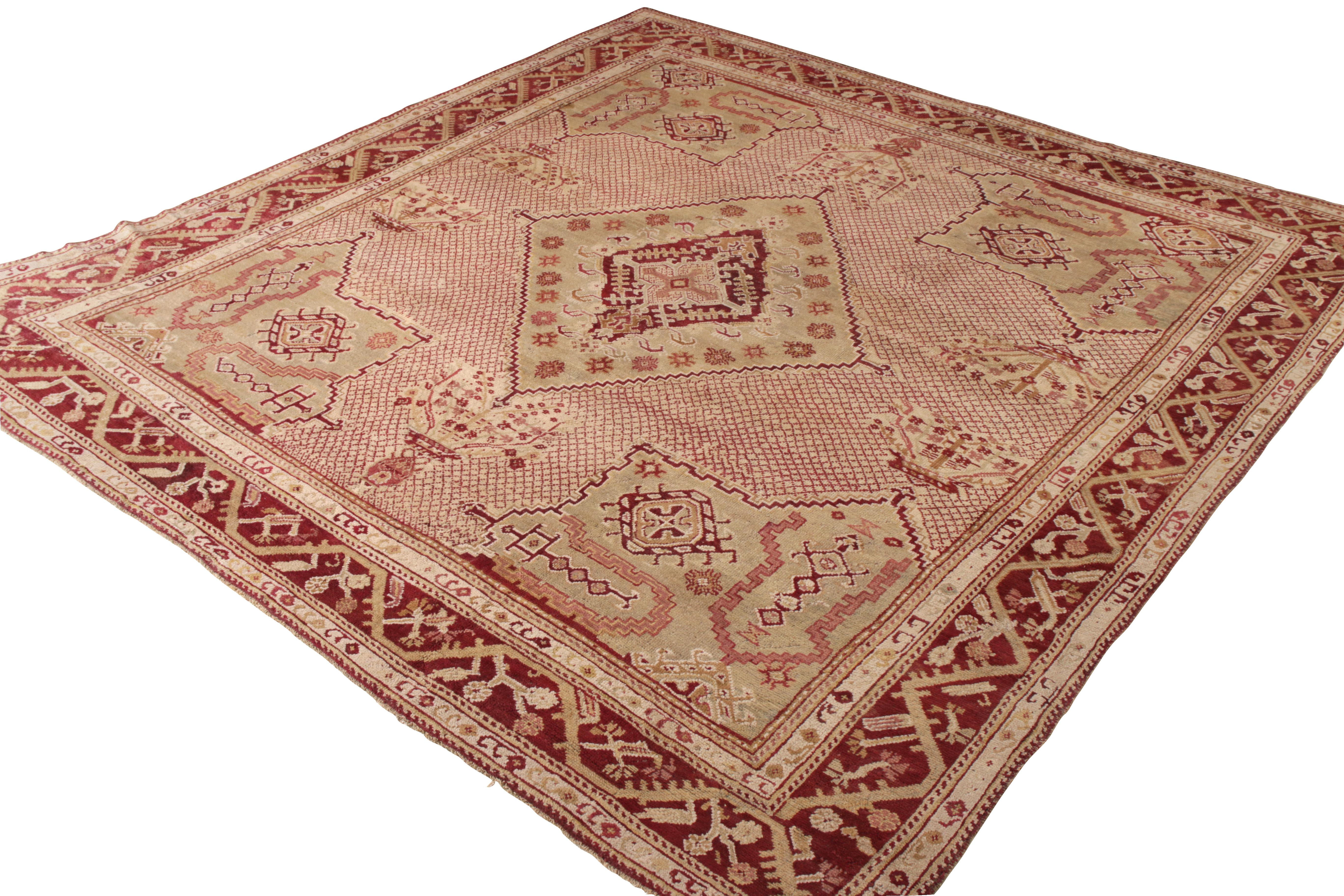 Turkish Hand-Knotted Antique Oushak Rug, Pink and Red with Green Medallion Pattern For Sale