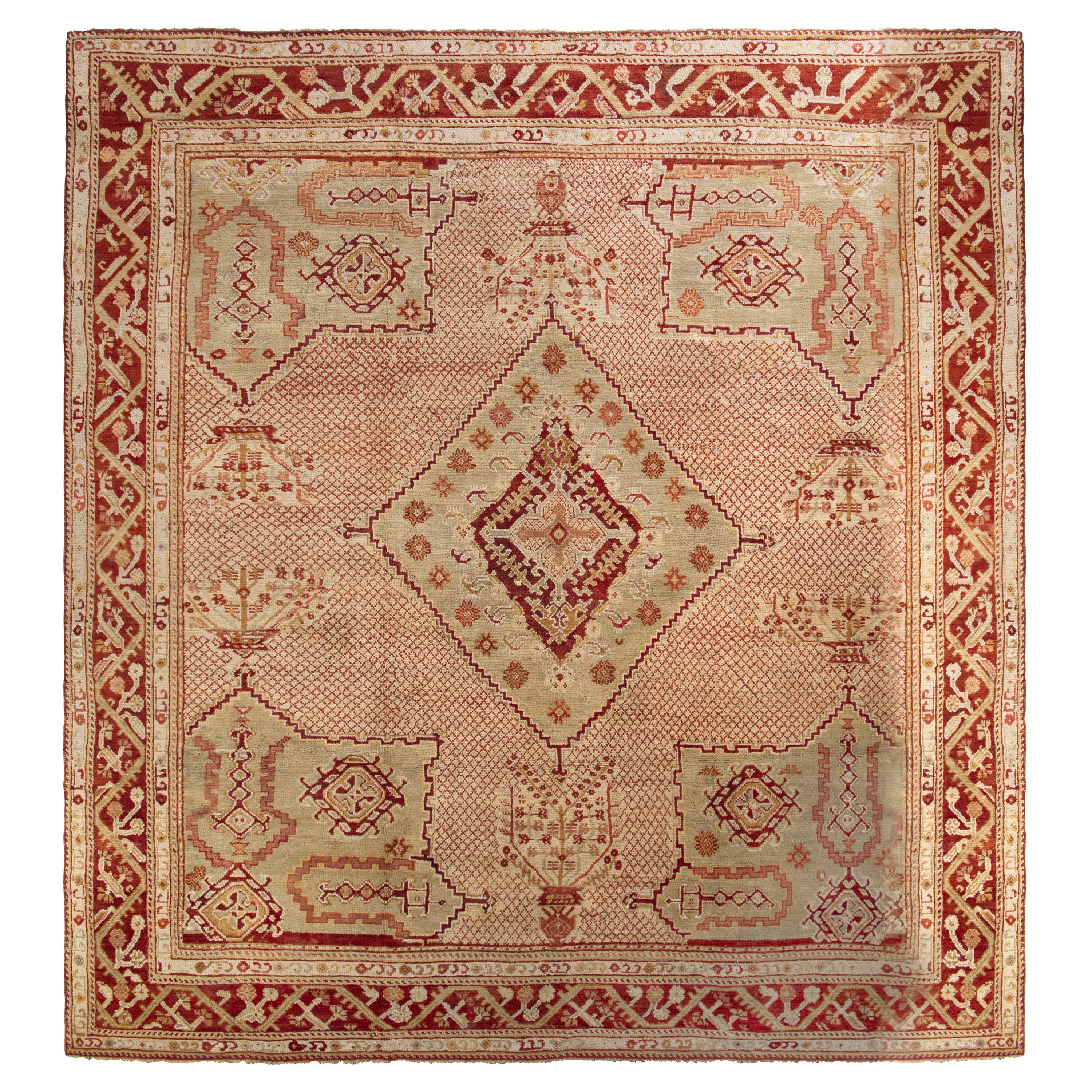 Hand-Knotted Antique Oushak Rug, Pink and Red with Green Medallion Pattern For Sale