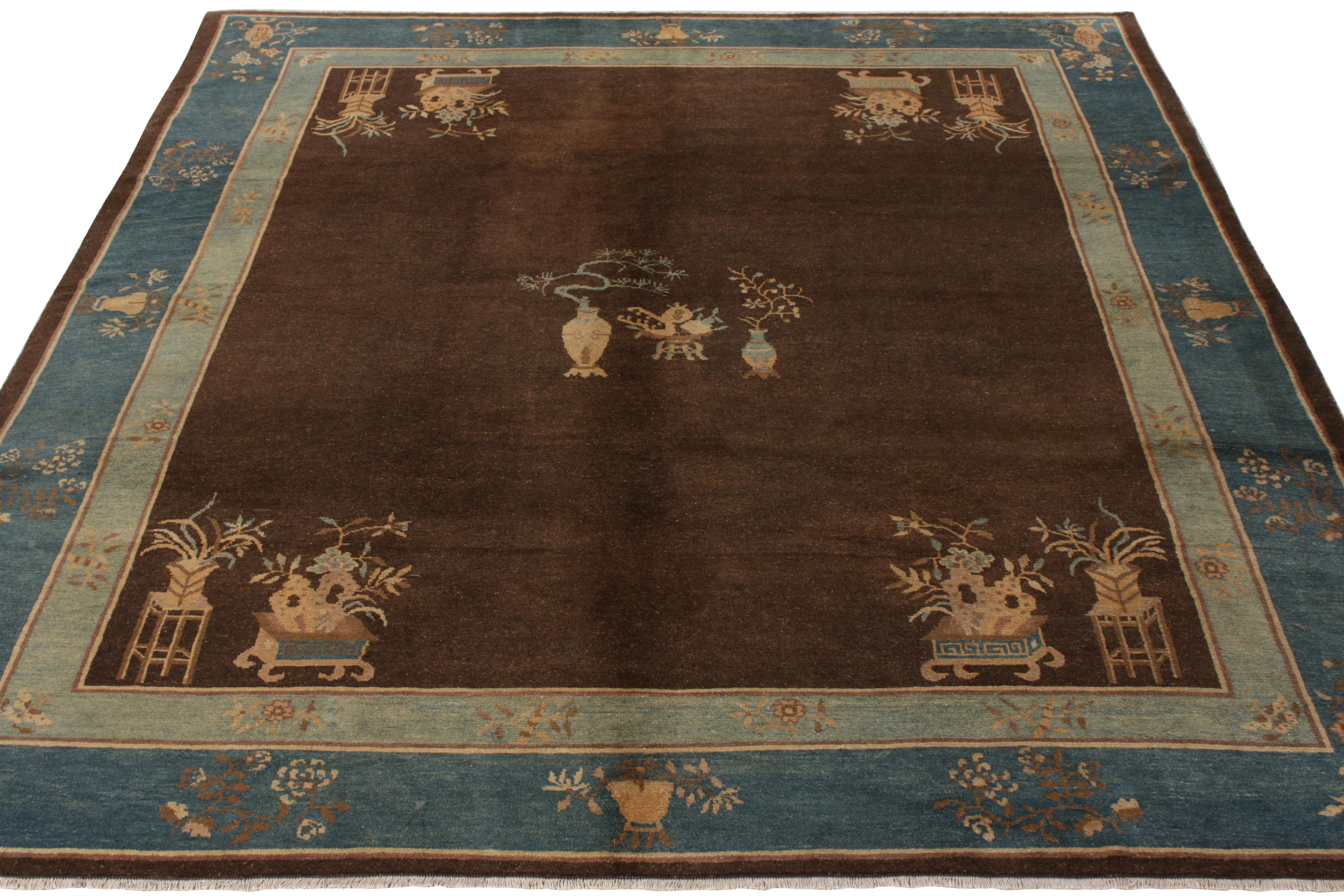 An antique Peking rug originating from China circa 1920-1930. Hand-knotted wool, the 8x9 rug exhibits exemplary Chinese Deco sensibilities with a pervasive pictorial floral pattern that features flower vases as a central medallion and on the borders