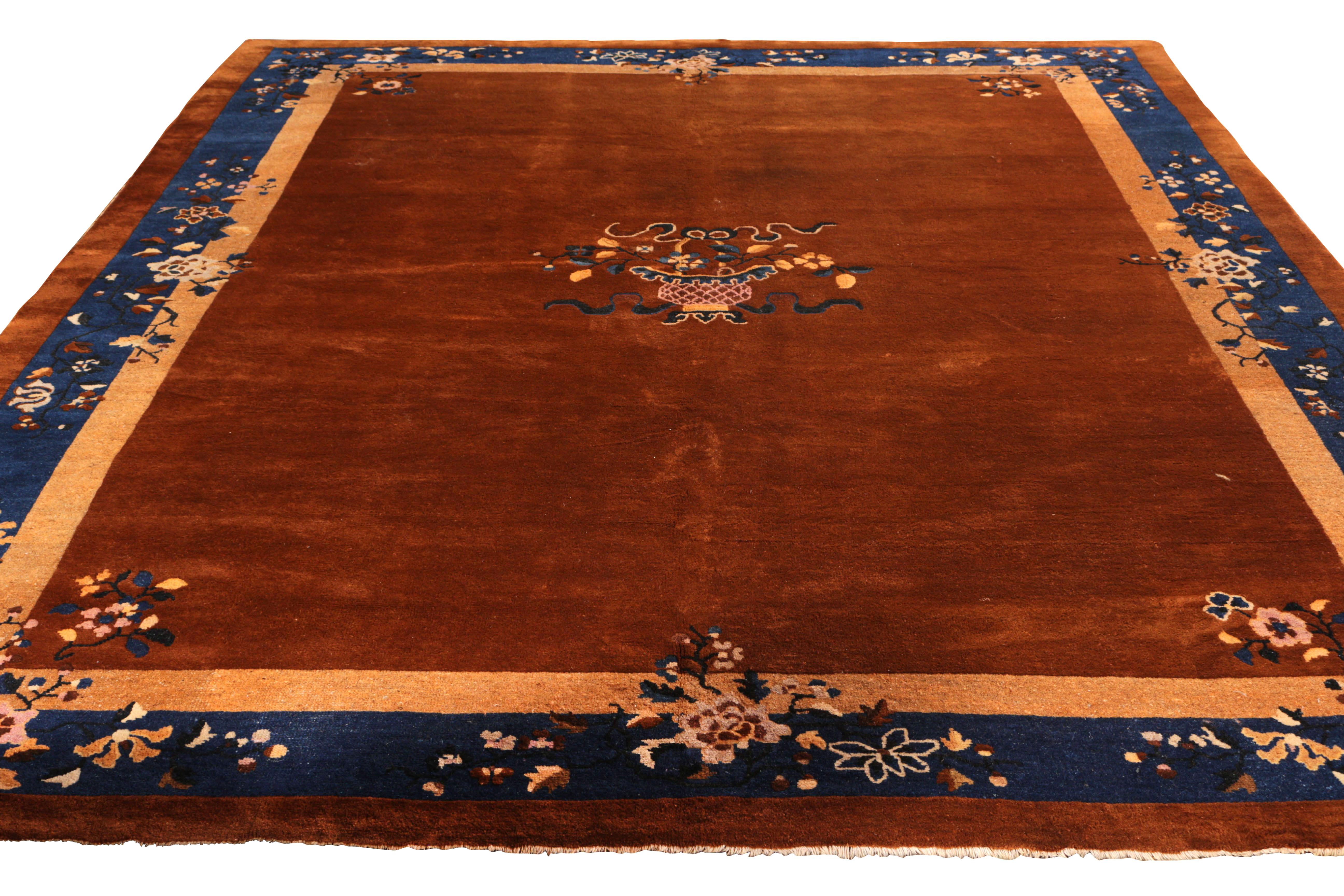 Hand knotted in wool originating from China circa 1920, this antique Art Deco rug enjoys a rich distinction among the Peking line of Rug & Kilim’s Antique & Vintage Rug collection—a marriage of open field and graceful stylistic floral motifs in a
