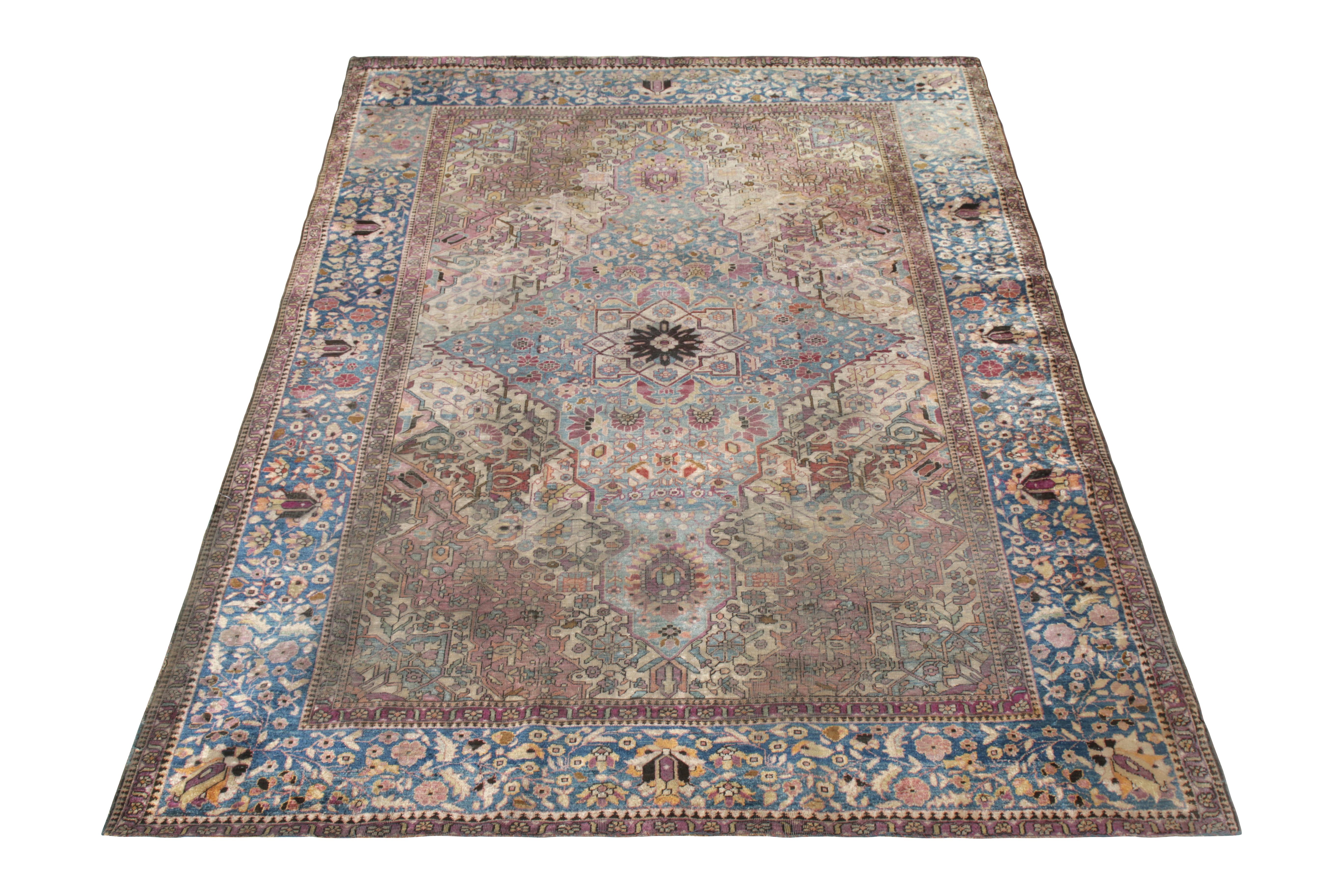 A 4x6 antique Persian rug of Farahan design in blue and pink, hand knotted in silk, circa 1890-1900. Some distress in the field, ultimately lending a classic charm complementing a unique sensibility even among this celebrated lineage.

Further on
