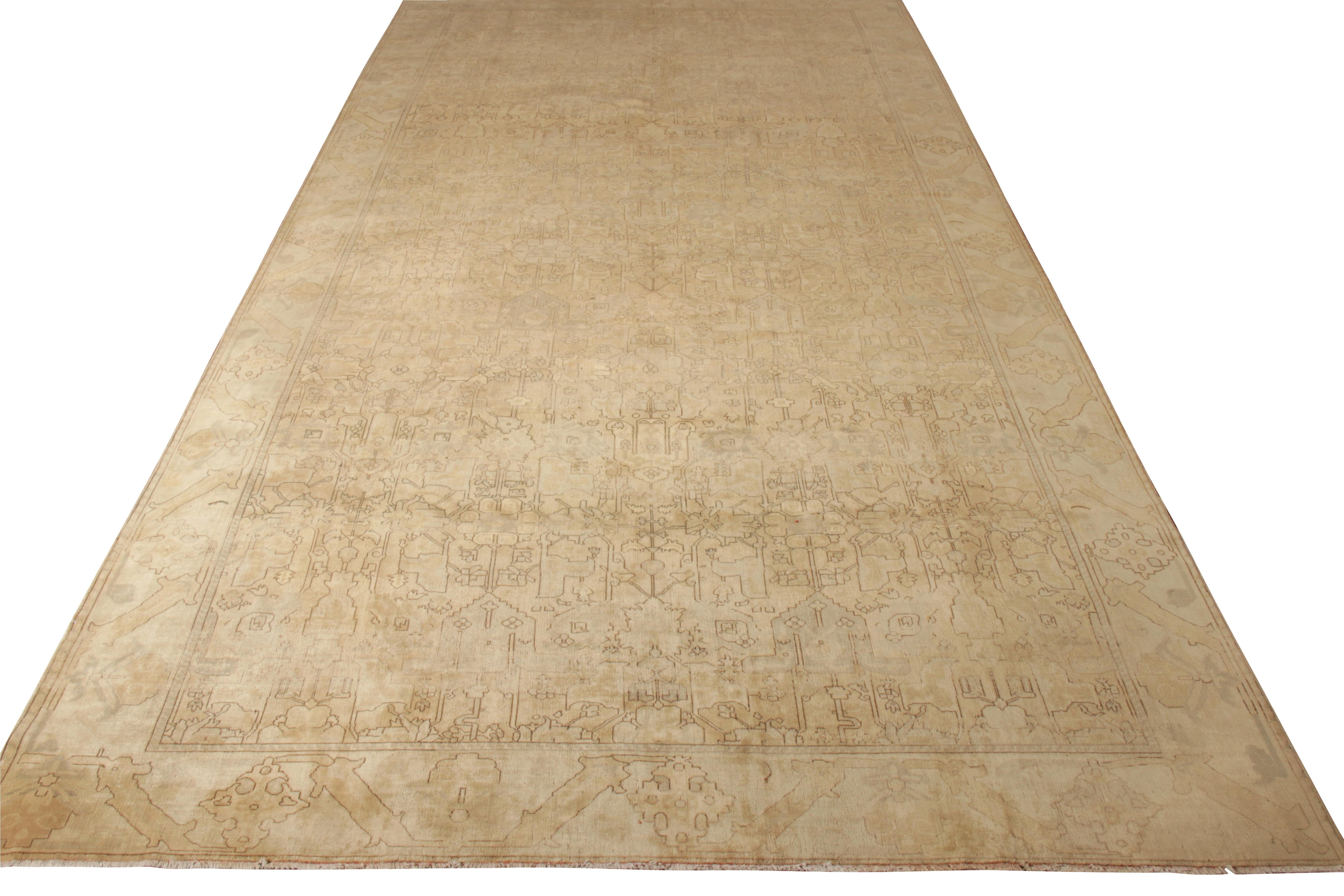 Sized at 9 x 18, this hand-knotted wool rug joins a distinguished line of antique Indian rugs inspired by celebrated Polonaise sensibilities. Originating from India circa 1920-1930, the rug flourishes in a rich beige-brown hues while calmly