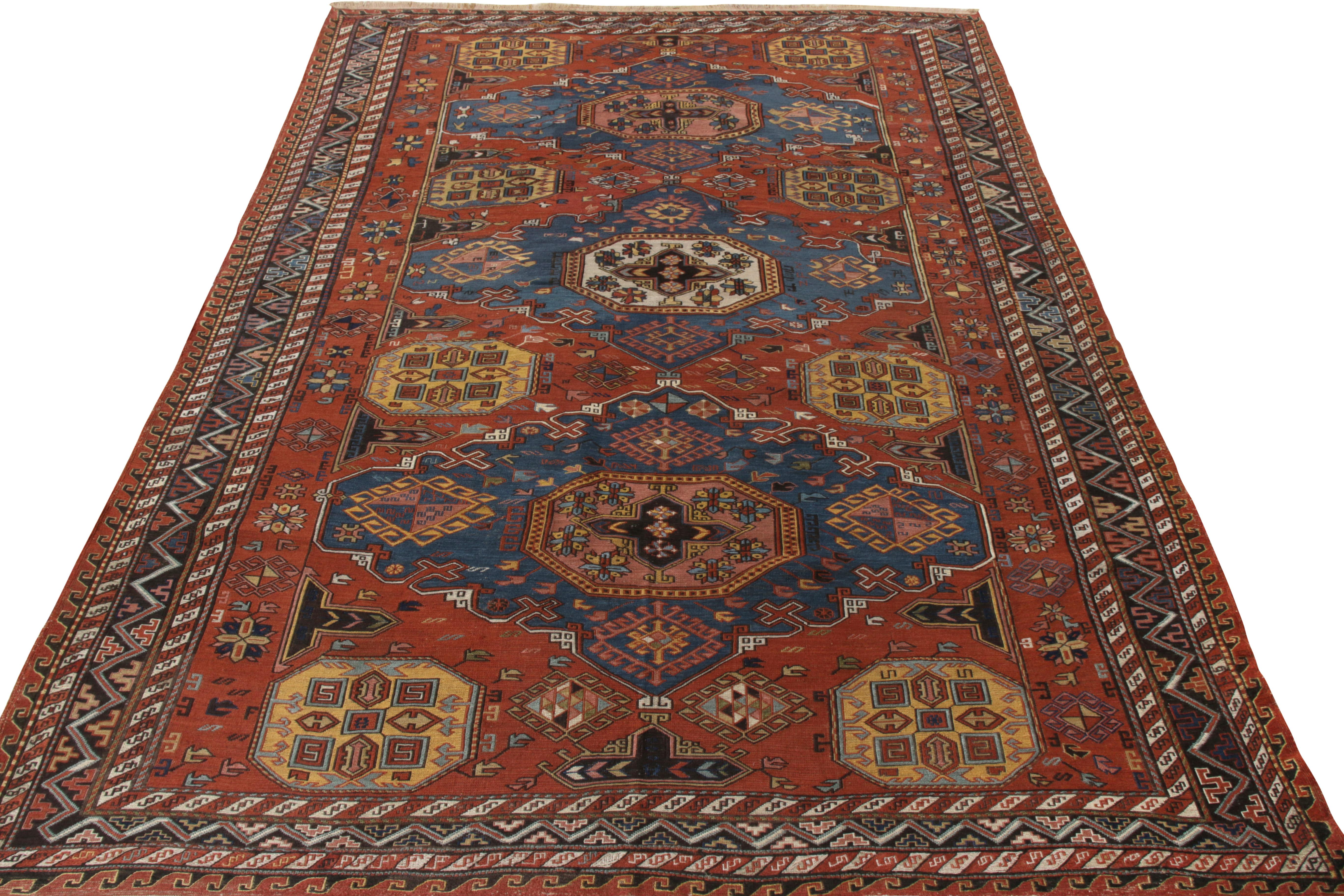 Hand-knotted in wool, an antique 7 x 9 Soumak rug originating from Russia circa 1920-1930. Joining Rug & Kilim’s Antique & Vintage collection, the piece showcases richness in color with luscious tones of blue & rust playing harmoniously with yellow,