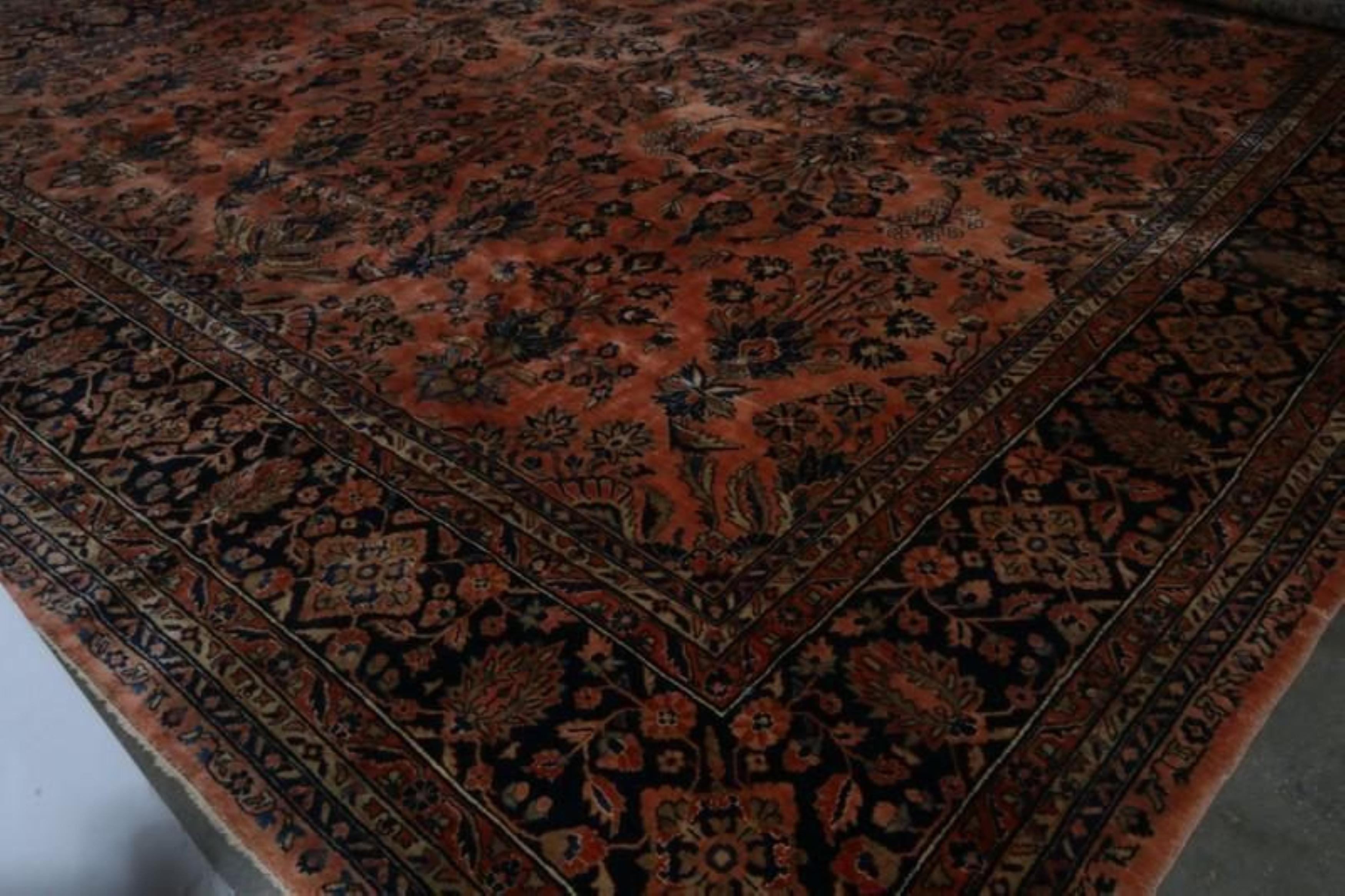 Wool Hand-Knotted Antique Sarouk Persian Rug in Orange and Black Floral Pattern For Sale