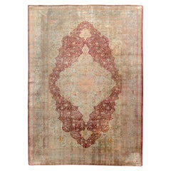 Handgeknüpfter antiker persischer Täbris-Teppich in rotem Medaillon-Muster