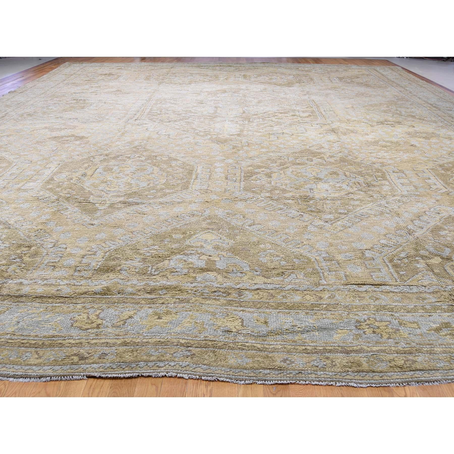 This is a truly genuine one-of-a-kind Hand-Knotted Antique Turkish Oushak Exc Cond Oversize Oriental Rug. It has been knotted for months and months in the centuries-old Persian weaving craftsmanship techniques by expert artisans.


Primary