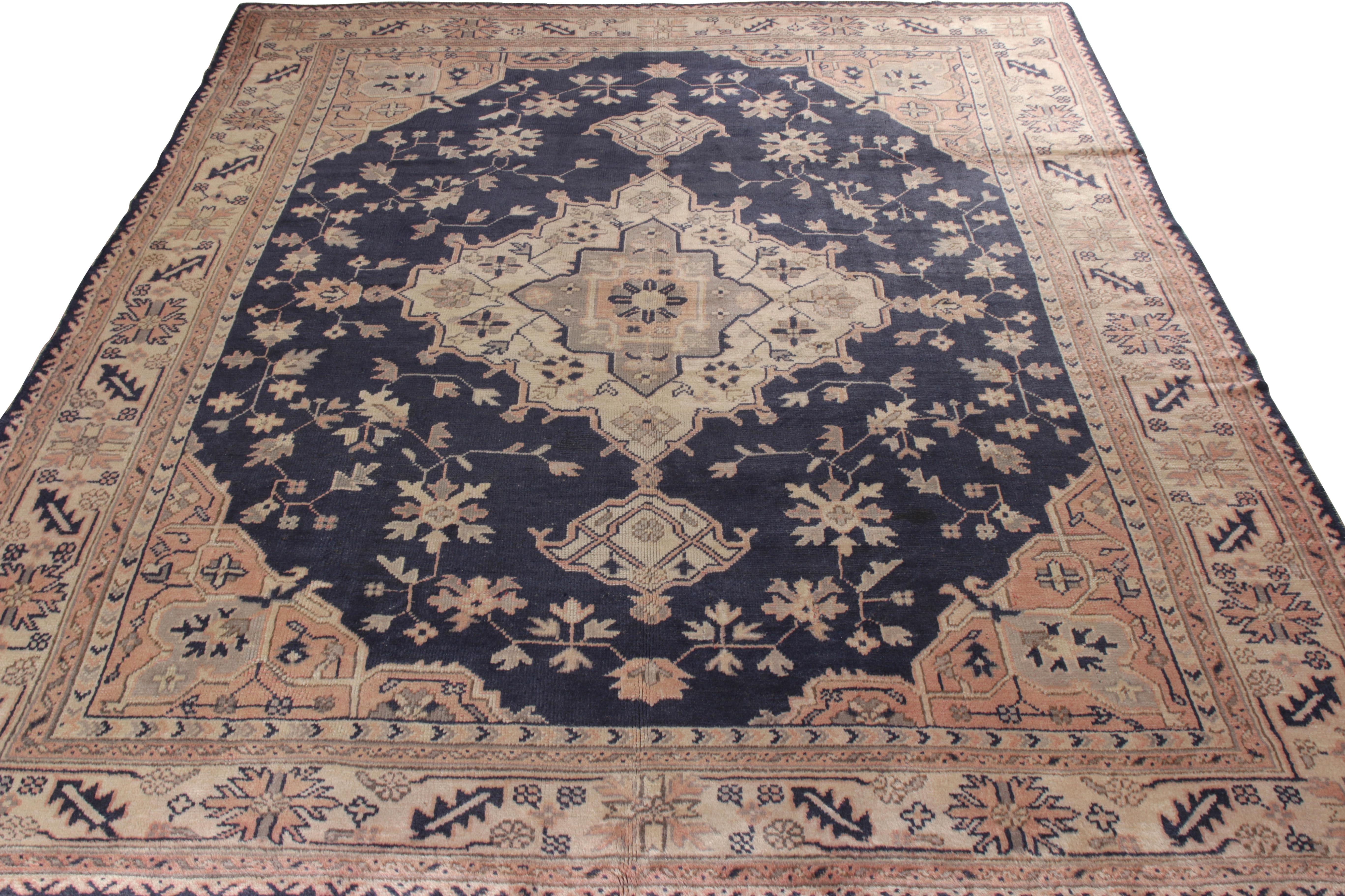 An 8x10 hand-knotted antique Oushak rug, originating from Turkey circa 1920-1930. Finely woven in wool, the rug enraptures the eye with an alluring medallion pattern embodying classic Oushak traits of finesse and elegance. This center of gravity