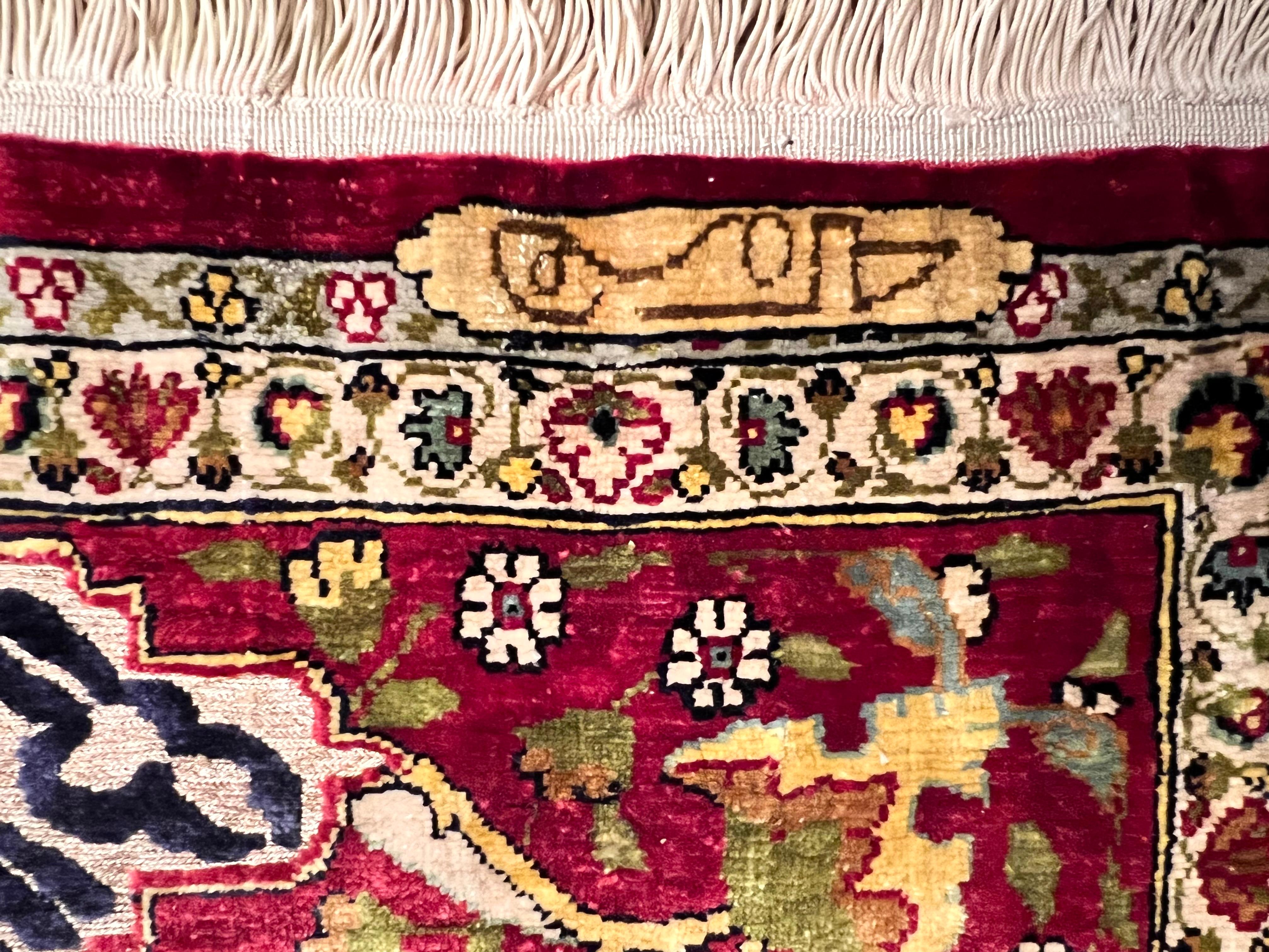 Rare, antique Turkish prayer rug. Signed on the upper right corner.

Material: silk, embroiled gold gilded metal threads.

Finest quality Hereke rug with Kayseri pattern - in excellent condition, as it was never used as a islamic prayer rug, but