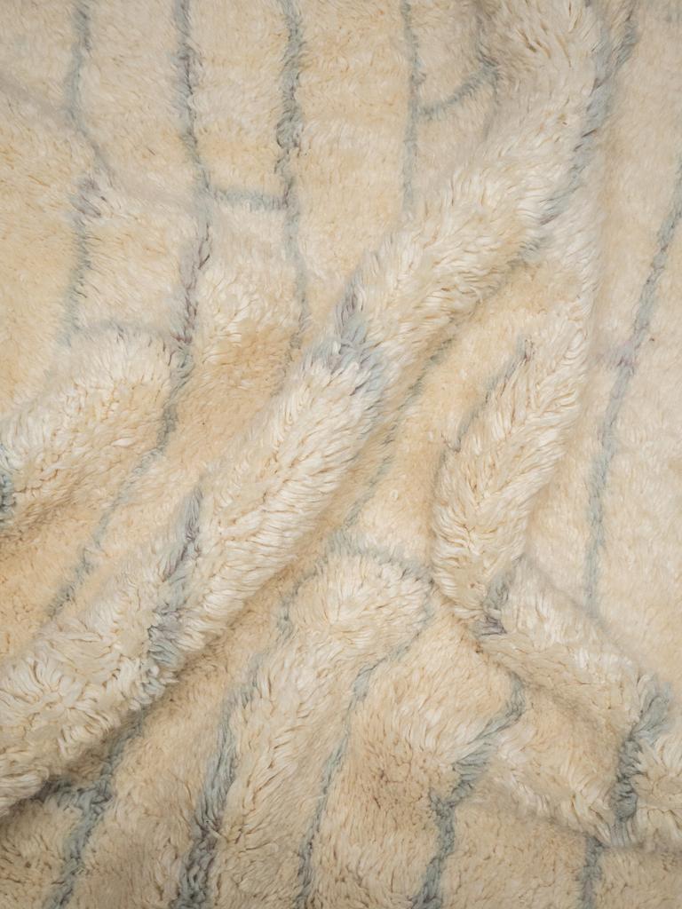 We exclusively create custom individual rugs for you. This means that we do not produce unnecessary items and we prioritize respecting nature. That's why we estimate it will take us around 7-8 weeks to create your rug.

Beni Mrirt rugs are made of