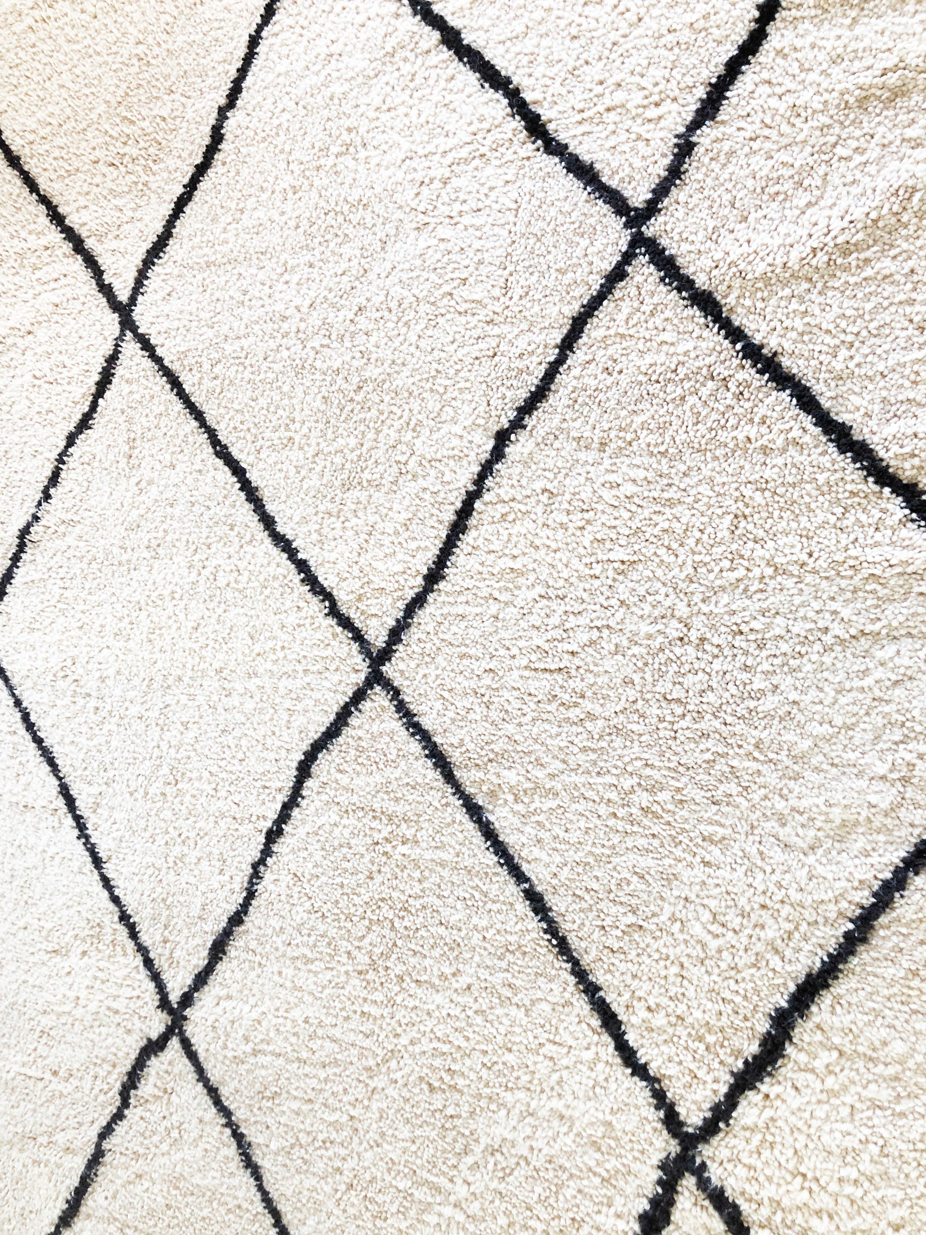 Sourced directly from a cooperative in northern Morocco's Atlas Mountains, Beni Ourain (Ouarain) rugs are known to be the most spectacular and luxurious of all Moroccan rugs, and some of the finest in the world. 

Beni Ourain rugs are pile-knot rugs