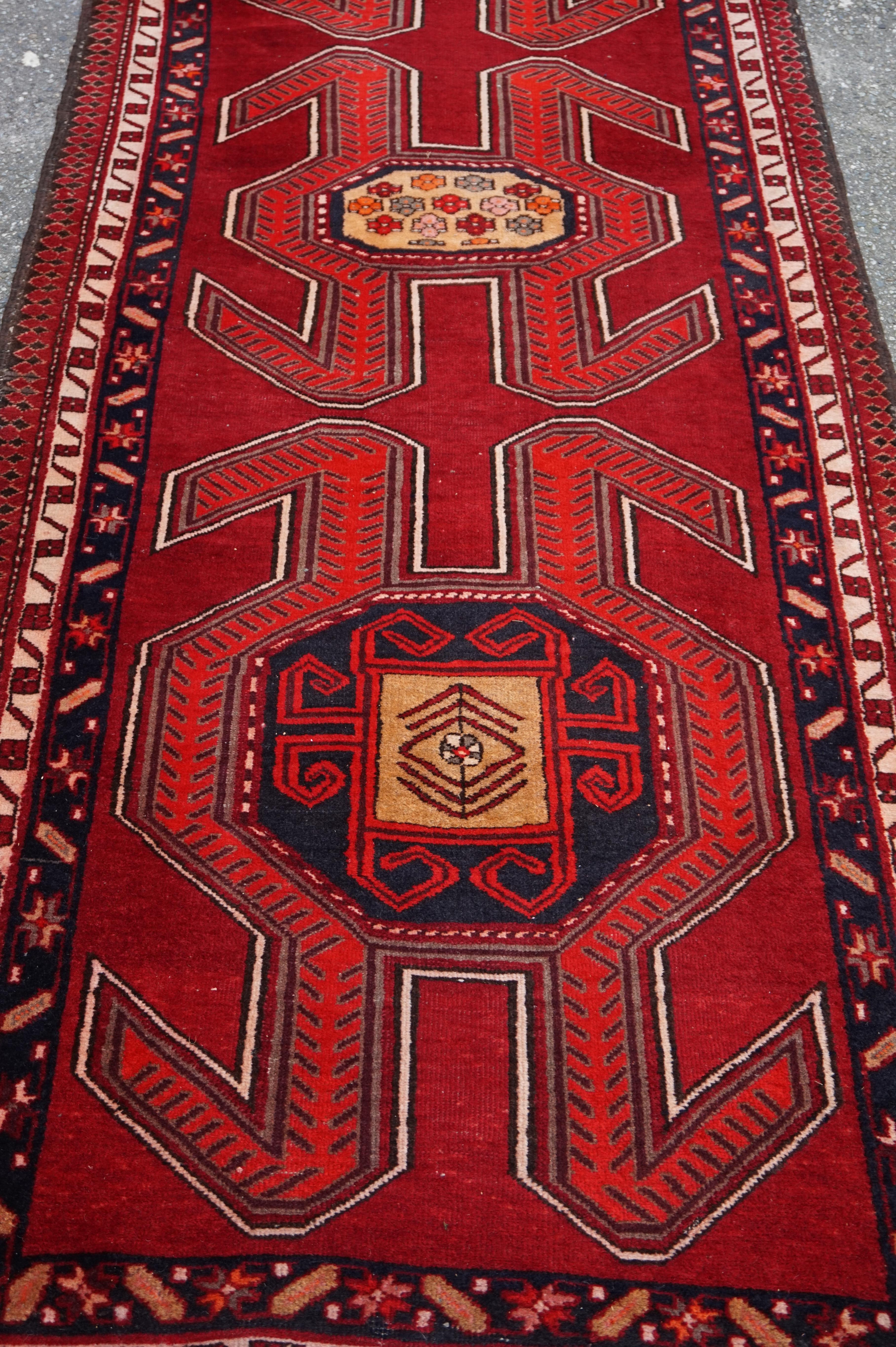 Mid-20th Century Hand Knotted Caucasus Tribal Runner Bold Symbolism & Vibrant Colours For Sale