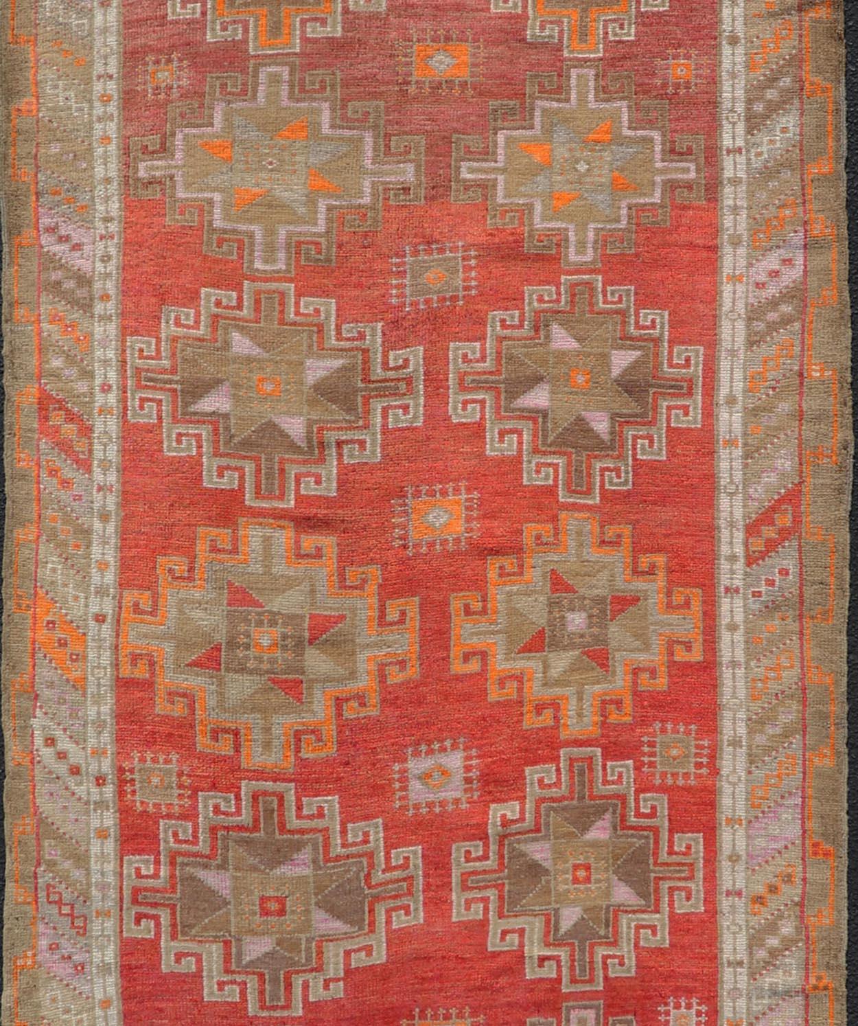 Vintage Turkish Kars/Oushak Gallery runner in red, brown, pink, ivory, orange and tan Keivan Woven Arts / rug/EMB-9671-P13566, country of origin / type: Turkey / Oushak, circa 1940

Measures:4'4 x 11'7.